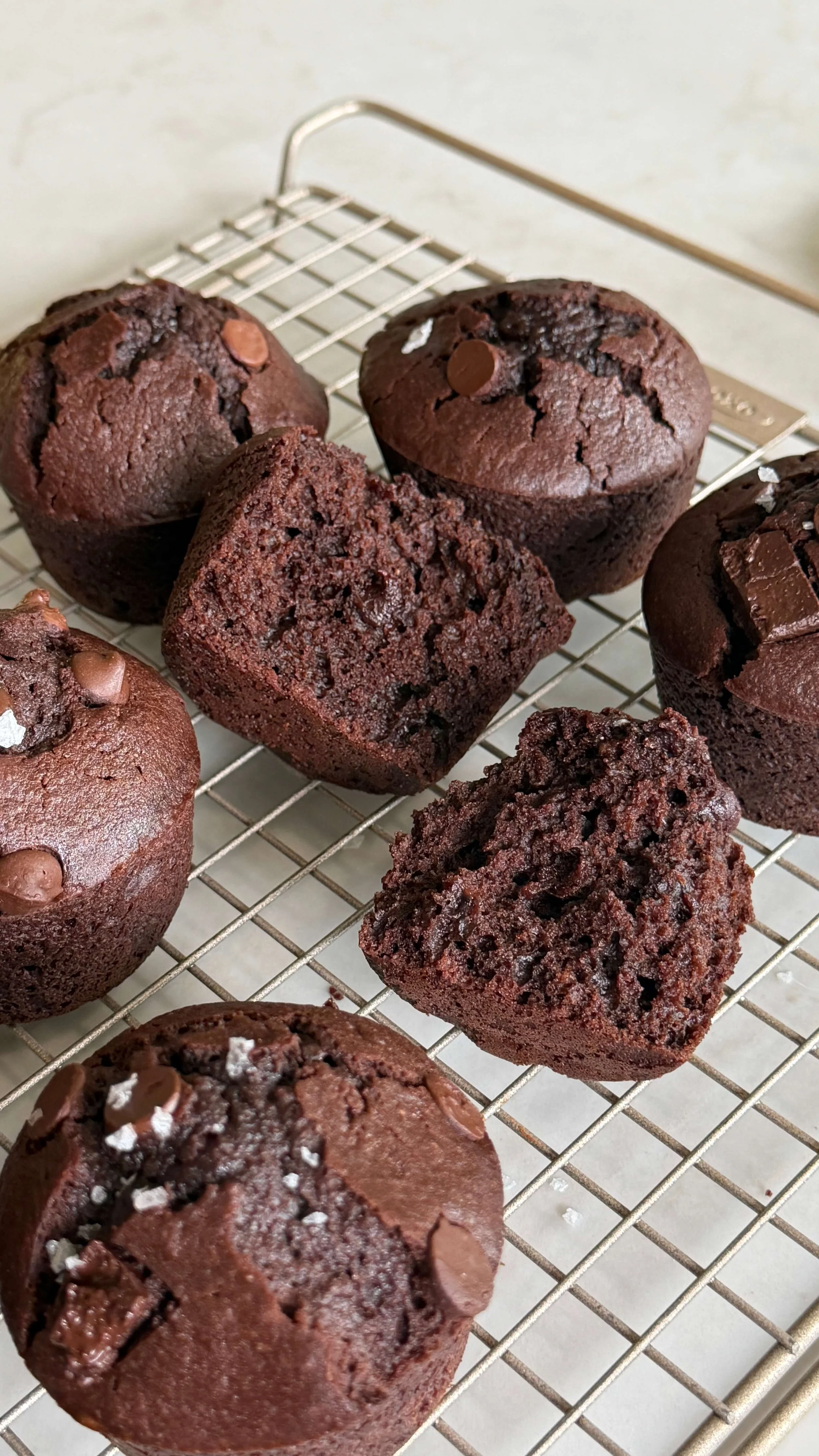 Chocolate muffins on wire rack