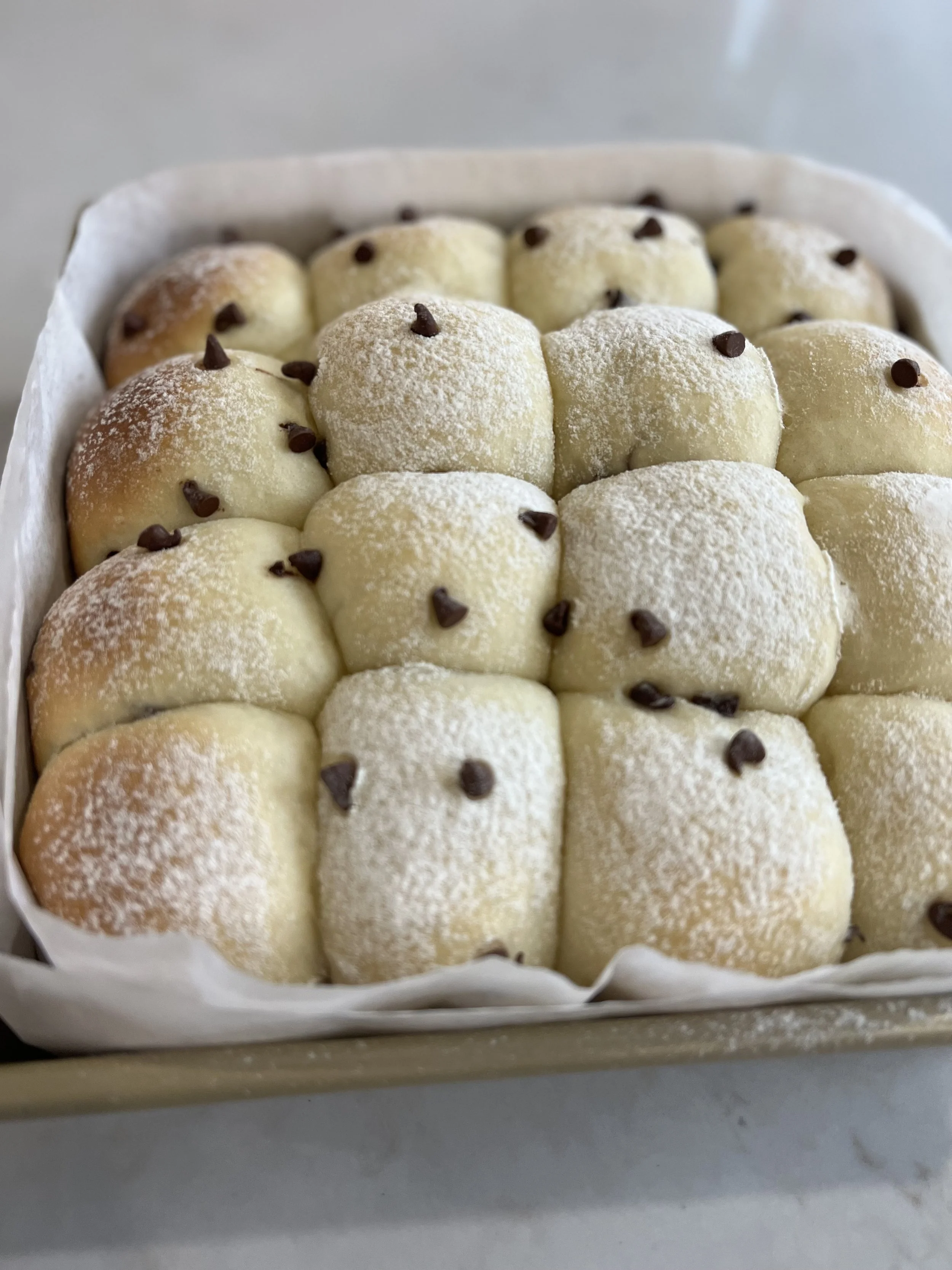 cookie dough milk bread rolls in square pan
