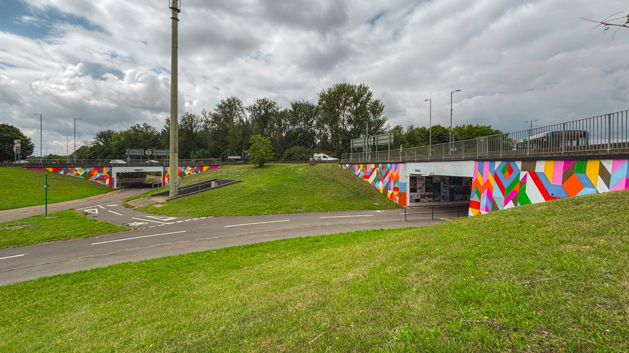 Public art mural by Carl Cashman featuring bold geometric patterns as part of the Stevenage Underpass Artworks.”