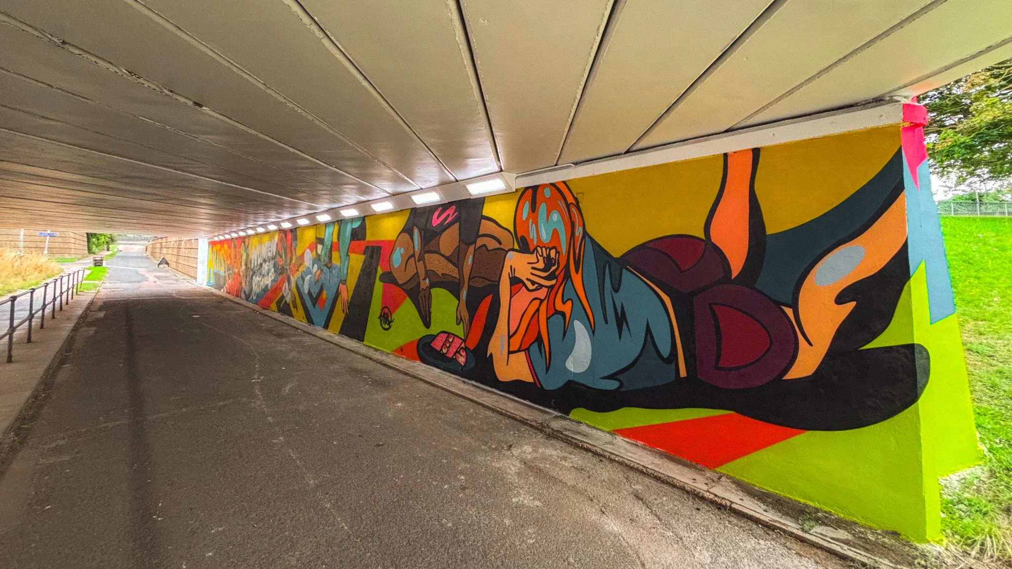 Expressive mural portrait by Molly Hankinson as part of the Stevenage Underpass Artworks, curated by Blank Walls.