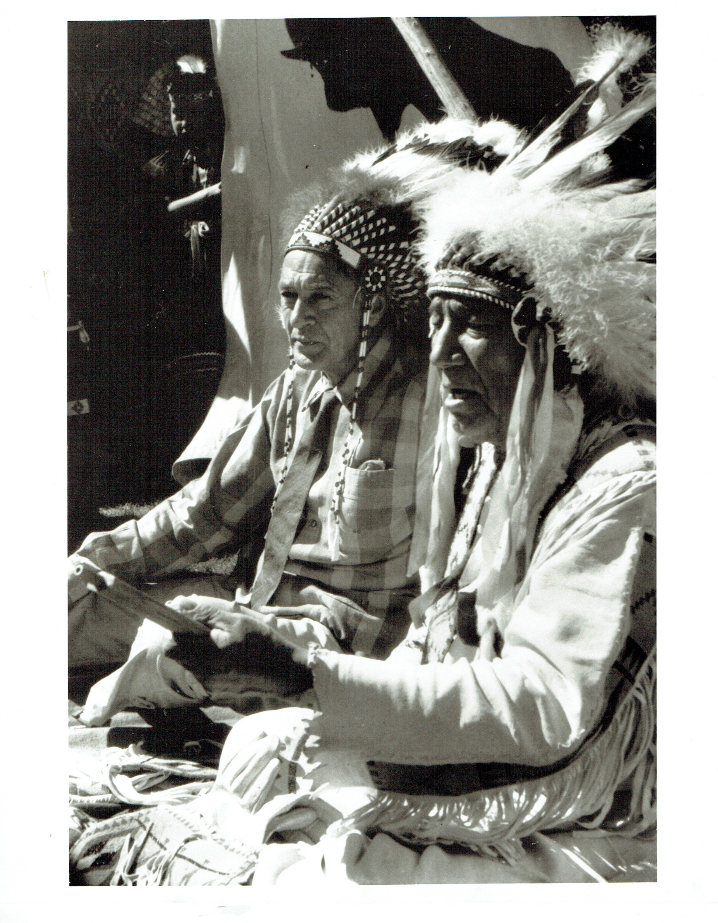 GC and Chief sitting with headdresses.jpeg
