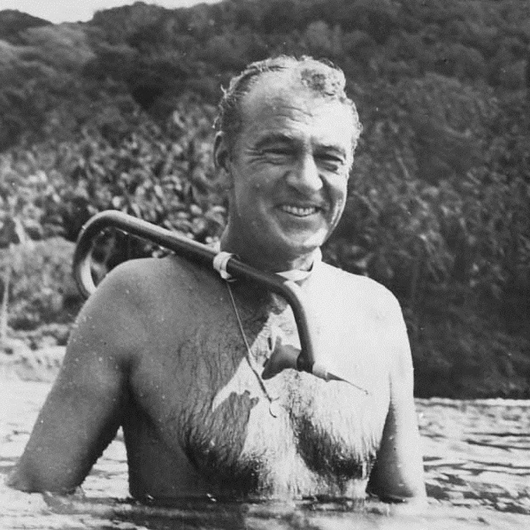 Let's take a dip into the past and revisit a moment of sun-soaked serenity with the legendary Gary Cooper! 🌞🌊 In this delightful throwback, Cooper's smile shines as bright as the shimmering waves surrounding him, a testament to the joy of ocean exp