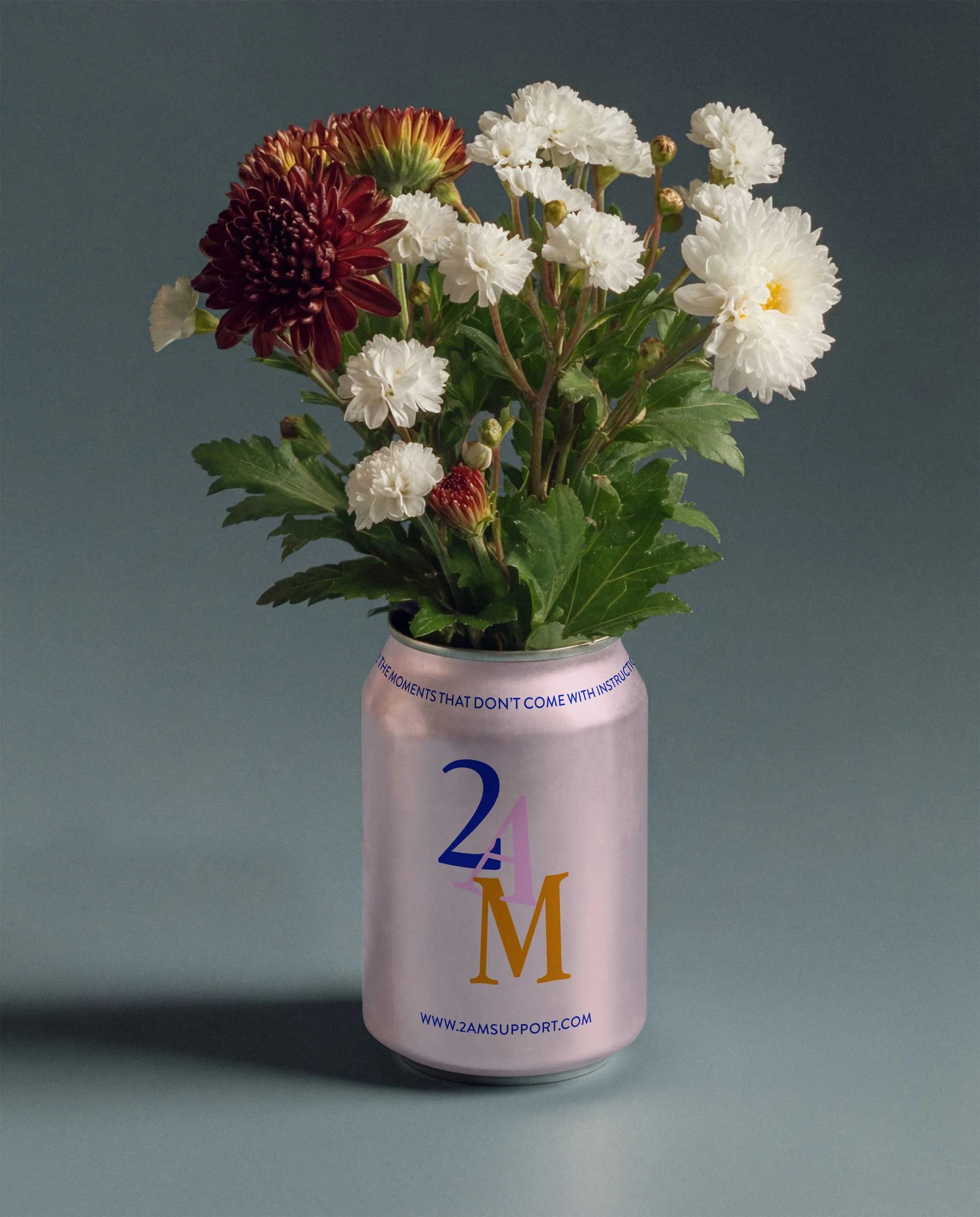 2AM branded flower arrangement featuring the colourful 2AM visual identity and logo