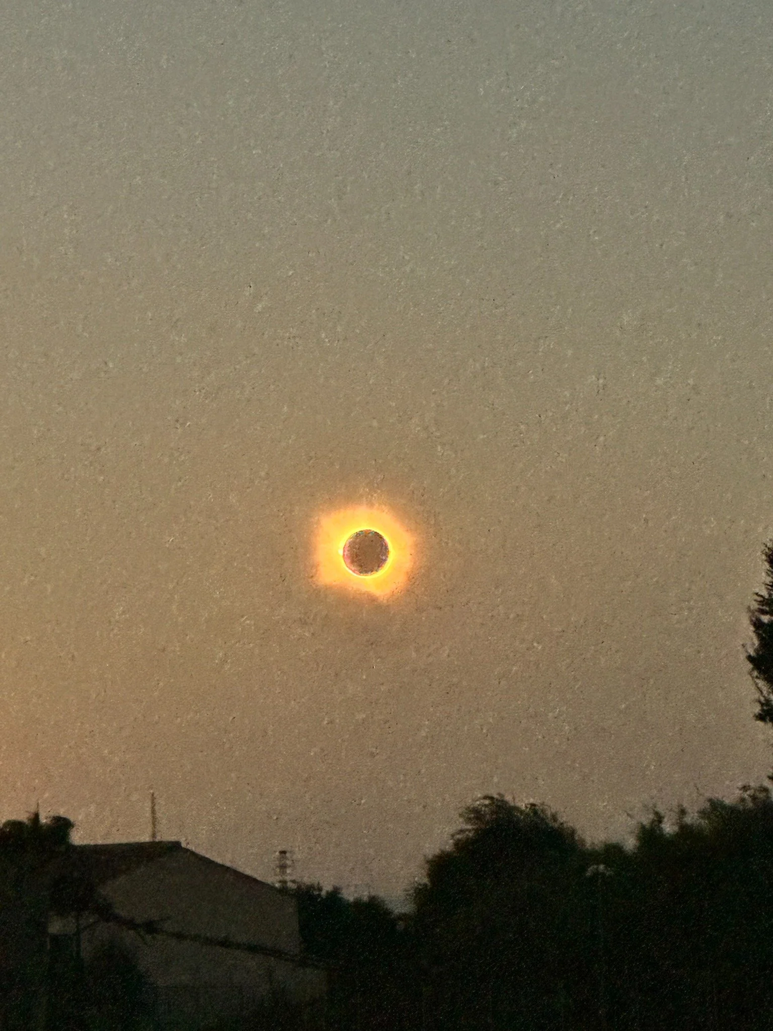 Solar eclipse viewed during an AM|FM-planned family journey in Spain.