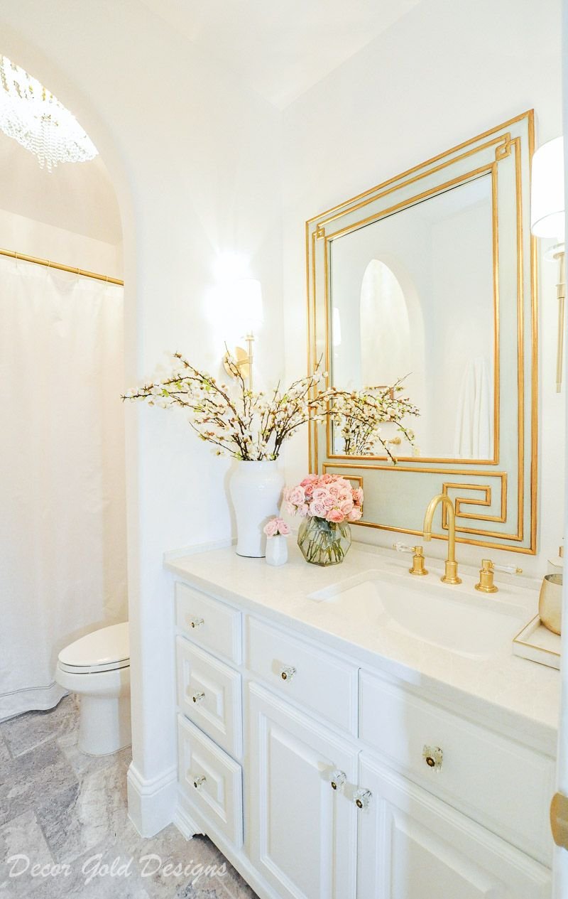 white and gold bathroom