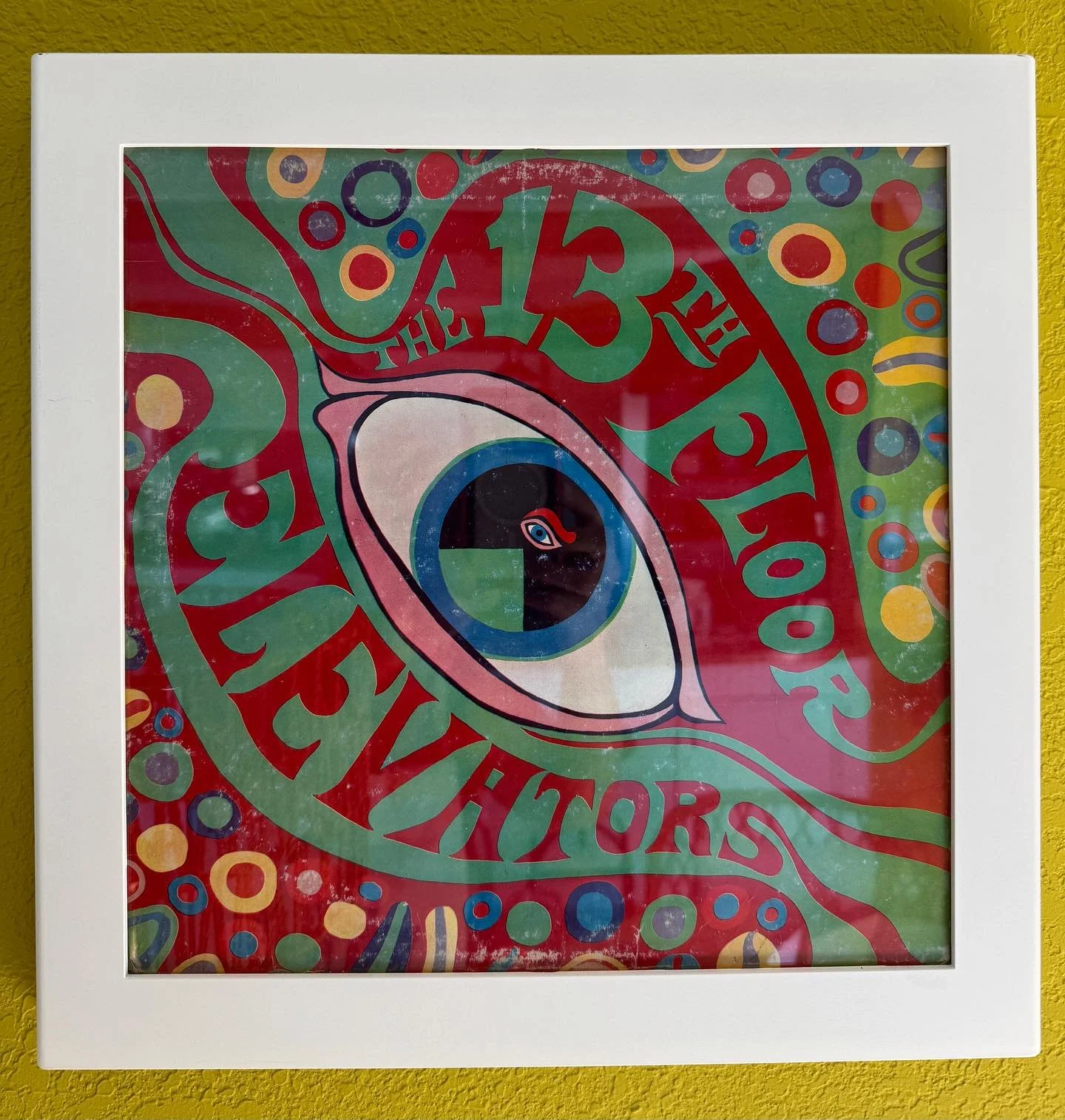 Yesterday I referred to an album cover which was not shown in the post. Here it is hanging in its frame at my house and yes it still plays well along with others in our collection. The other is a painting that was hanging in the same room but will be