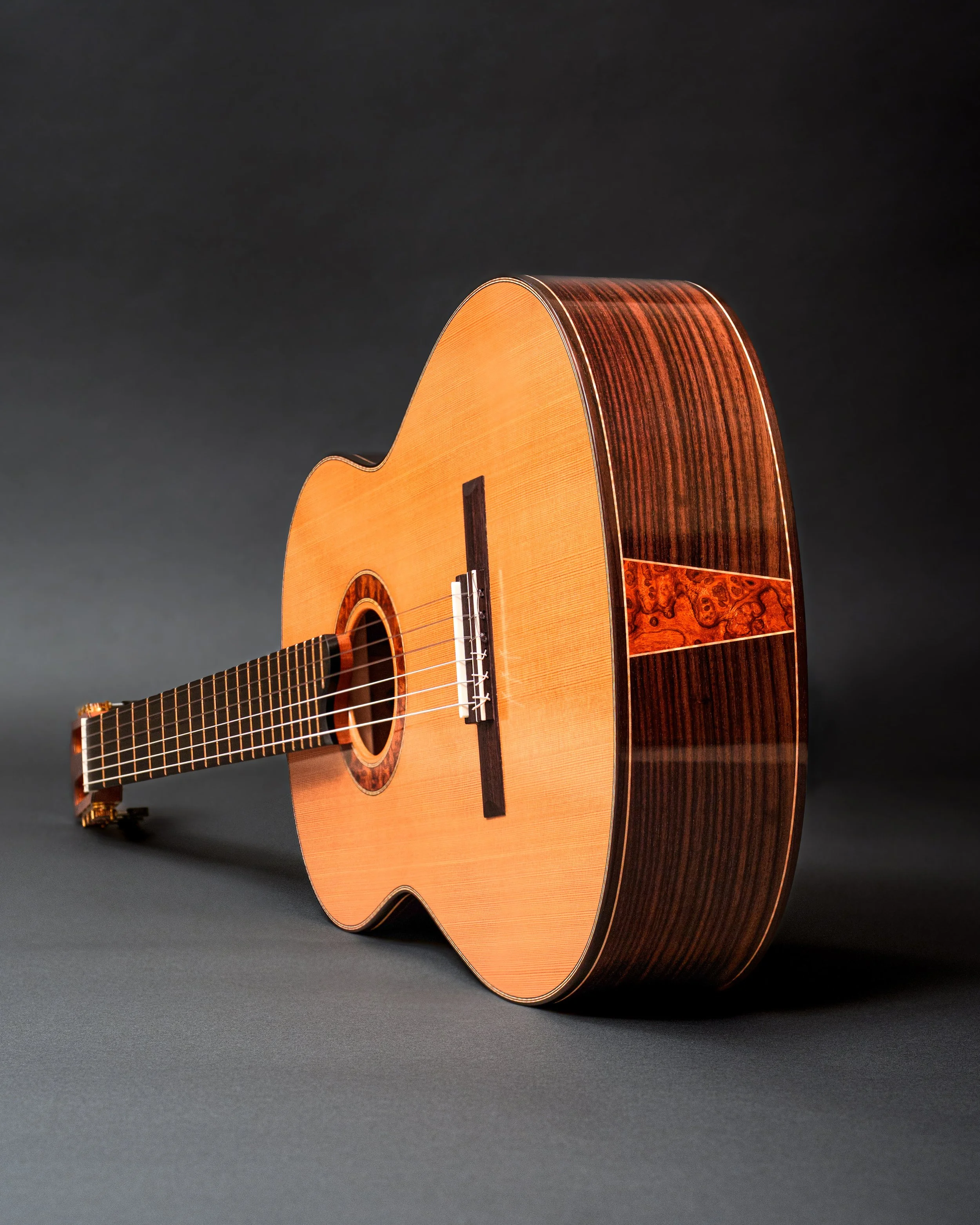 Desert Ironwood Burl end graft on a cedar top classical guitar