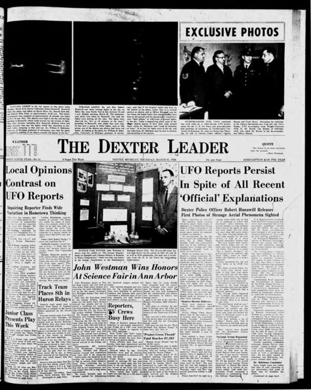 Black and white newspaper front page titled "The Dexter Leader," featuring articles on UFO reports, local opinions, and a science fair, along with photographs including a group of people and a display board.