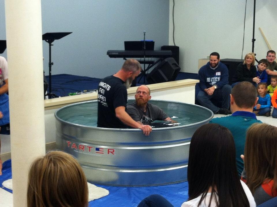 Fred being baptized