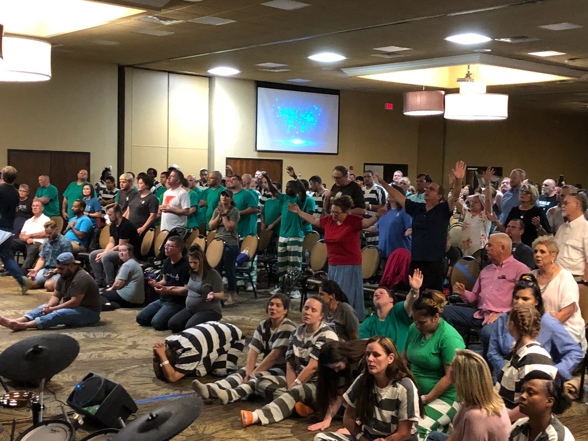 Recent photos from the church services in Hopkins County, Texas. The prisoners are in striped uniforms.