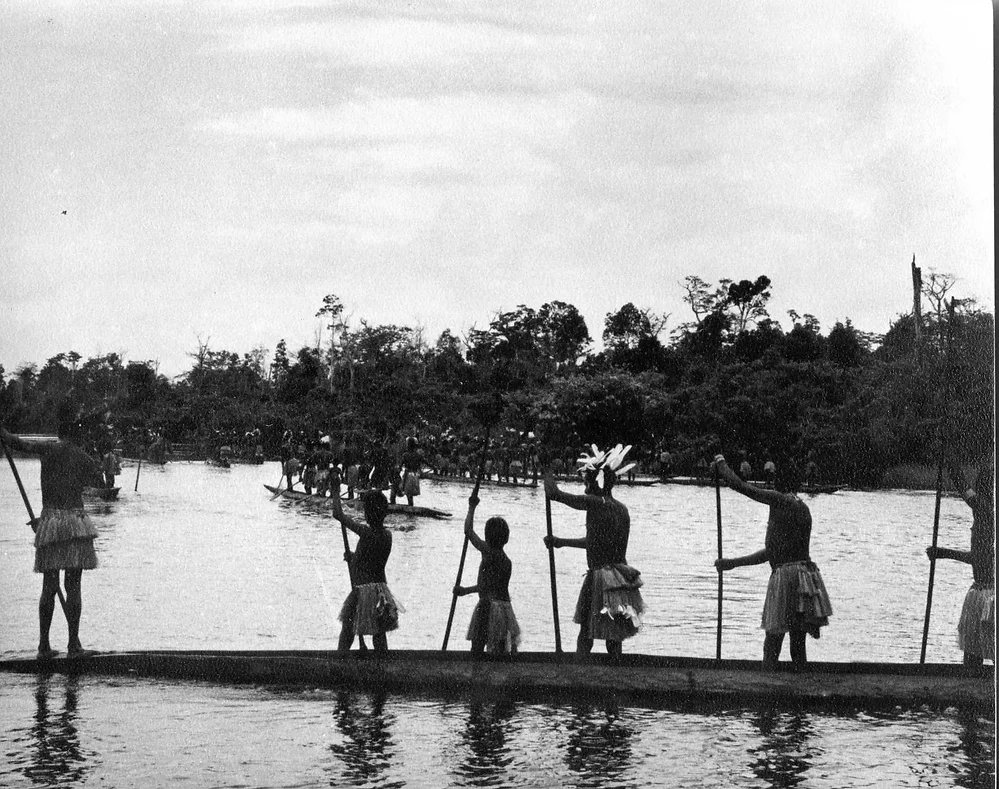 more Sawi warriors on canoes