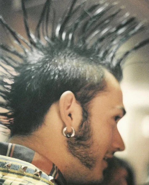 Brandon Hendricks as a punk rocker