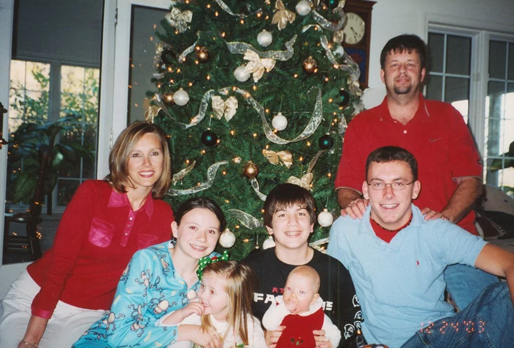 Brandy and her brother celebrating Christmas, shortly after they moved in with Kim and Mike