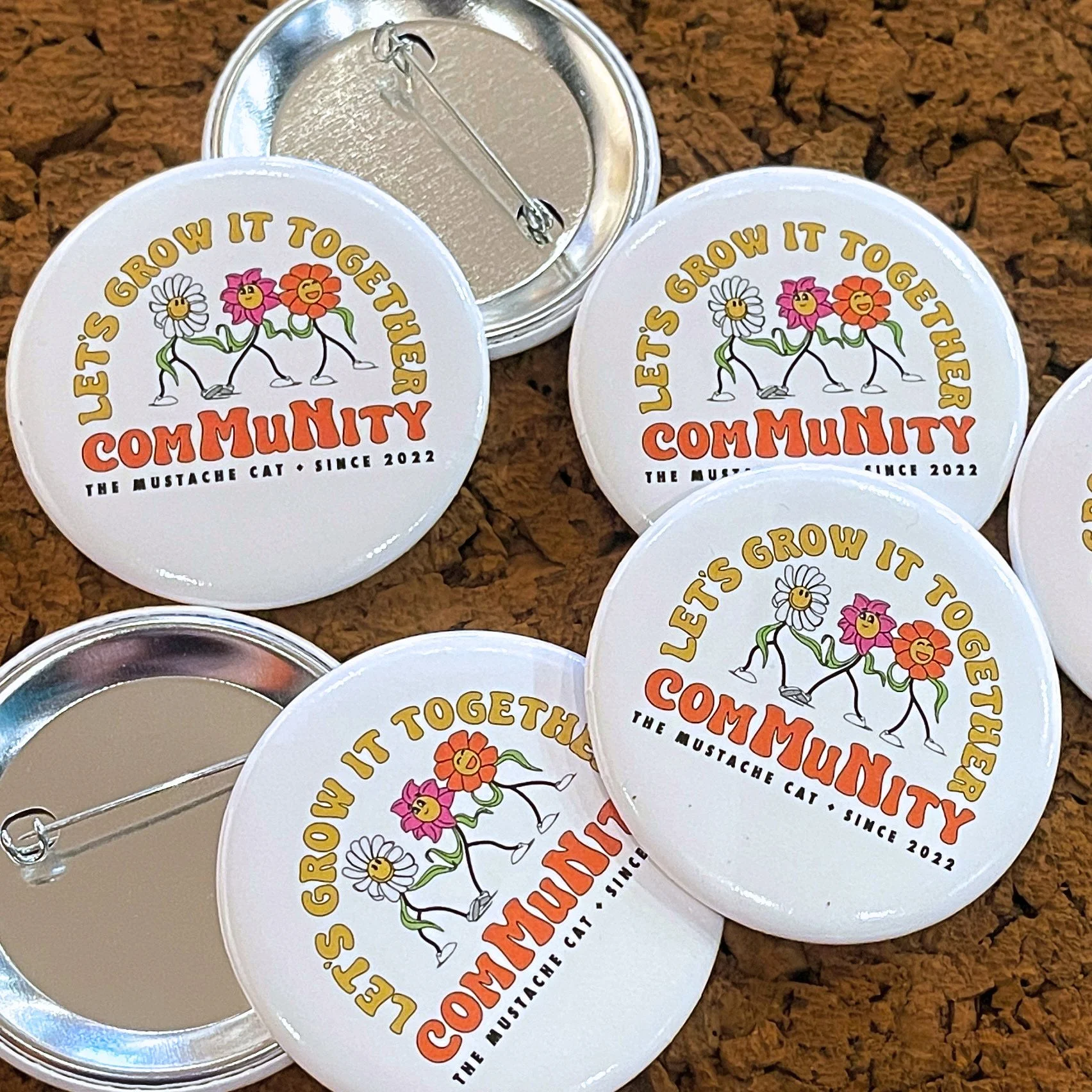 ComMuNity Pin