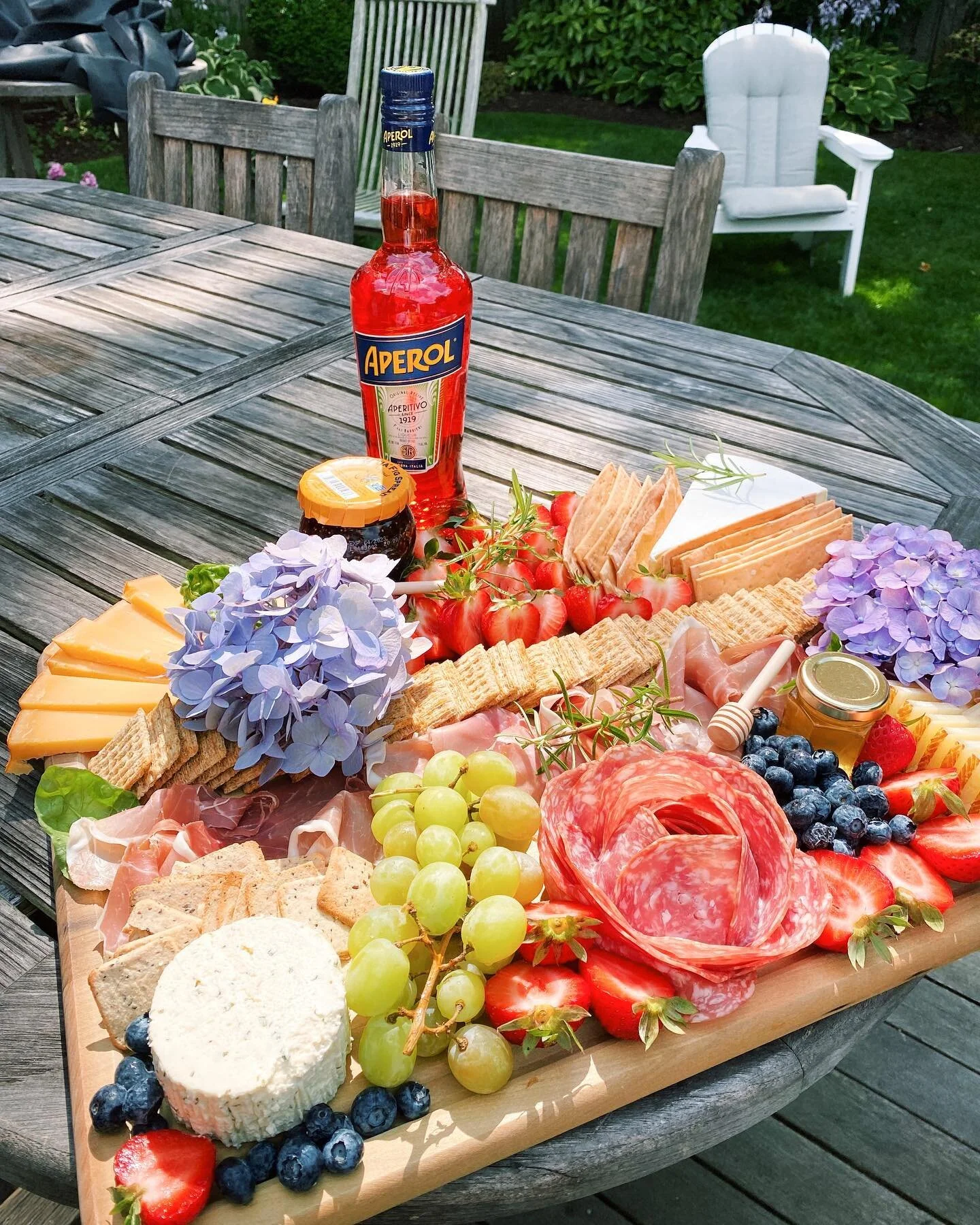 It&rsquo;s a rainy day on the Gray Lady and I can&rsquo;t think of anything better than getting a charcuterie board and a LARGE aperol spritz! 

DM or click the link in my bio to order!!🧀🤍