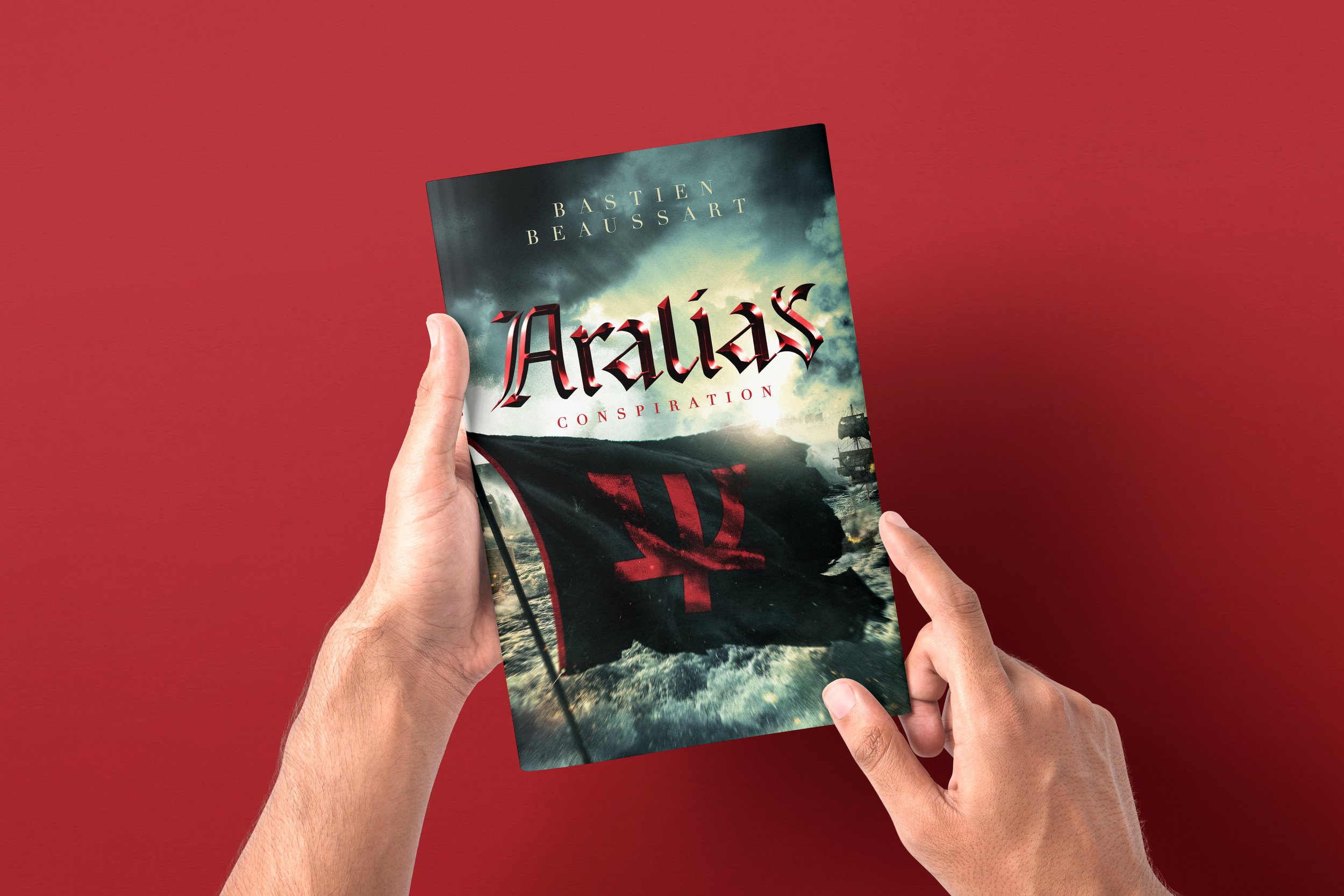 A person holding a book titled 'Aralis' with stormy clouds and a dark landscape on the cover.
