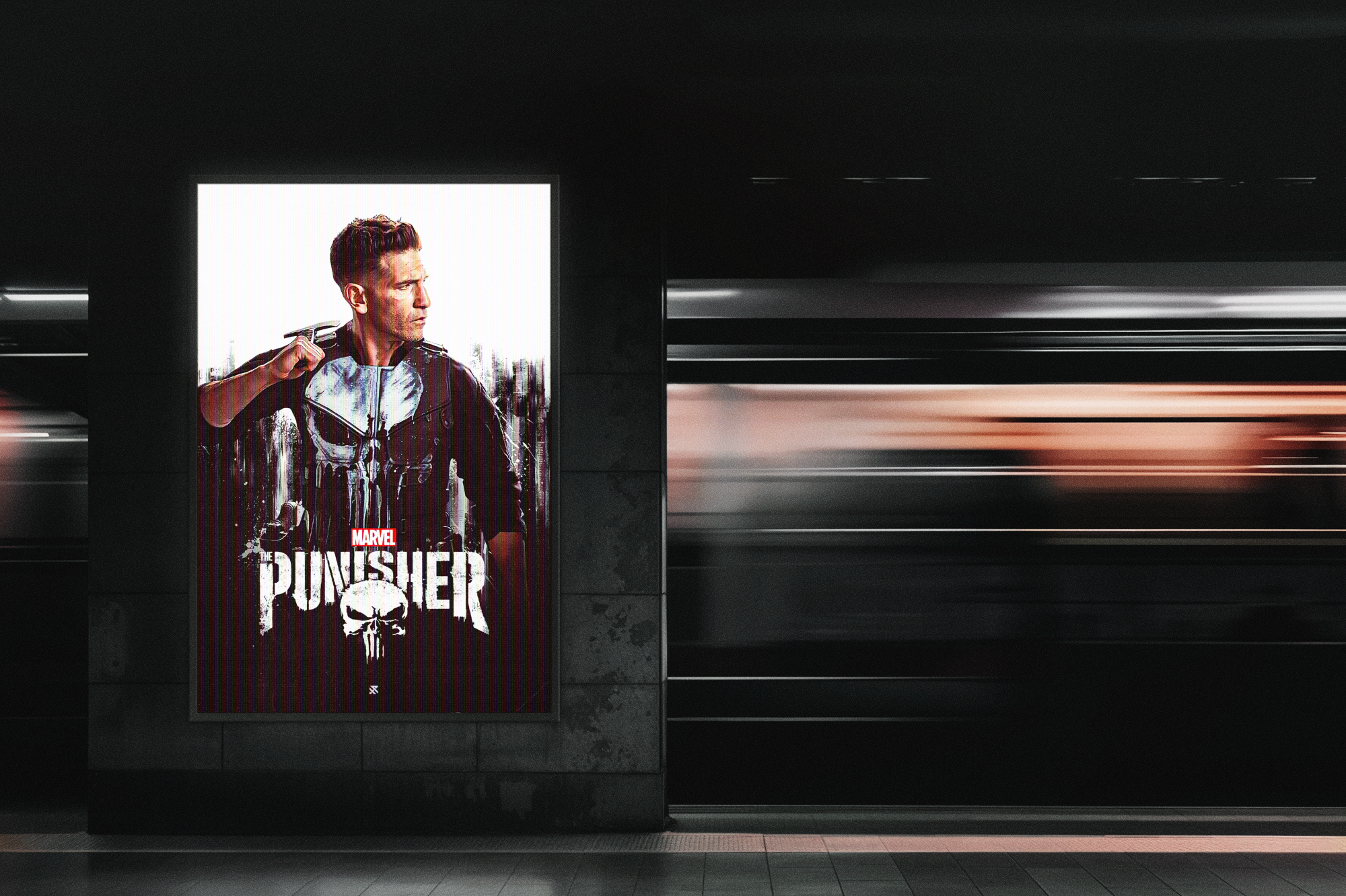 Advertisement poster for Marvel's The Punisher featuring a man holding a gun on his shoulder, with a serious expression, standing in front of a plain white background. The poster has the Marvel logo and the title "The Punisher" with a skull logo beneath.