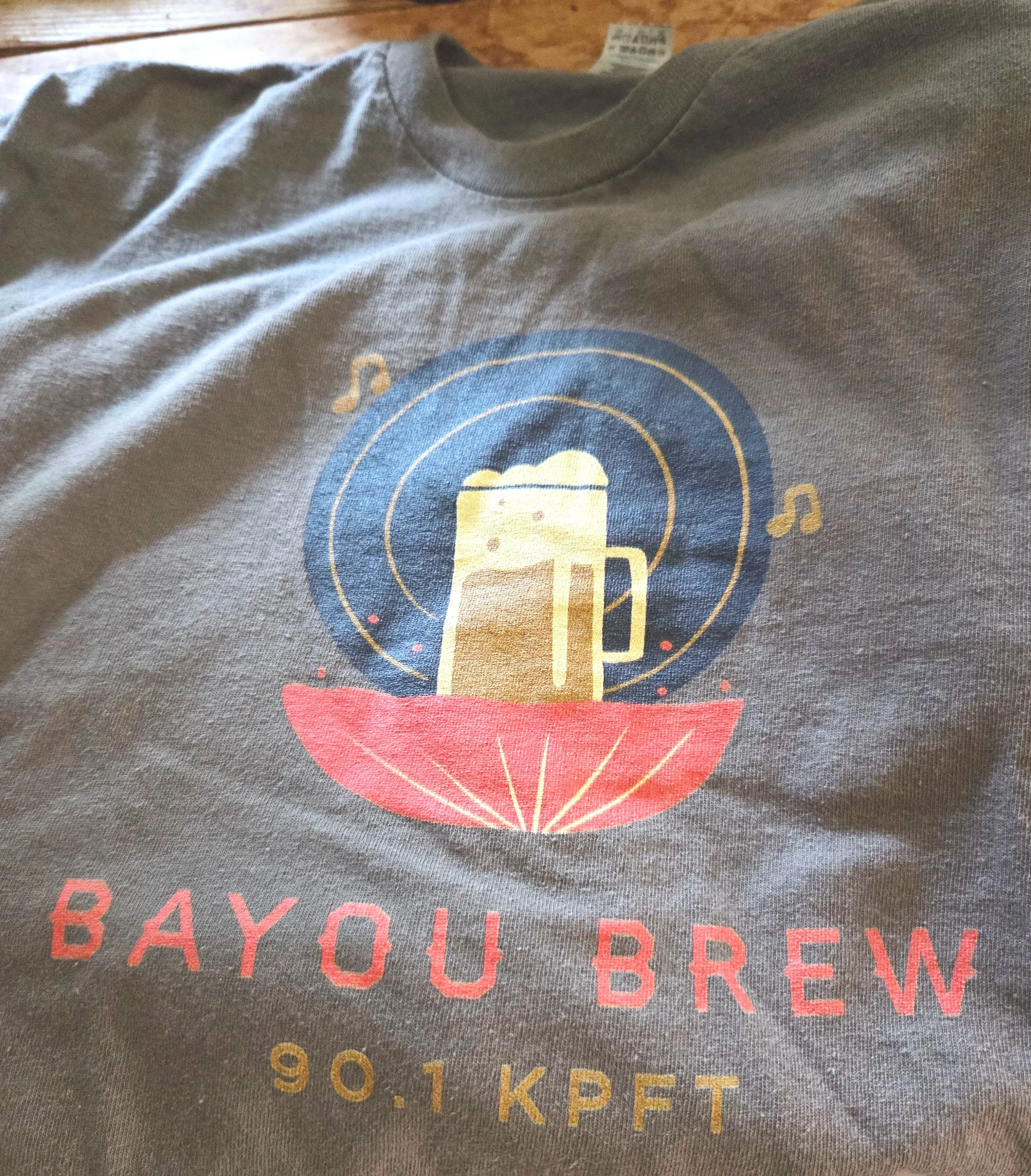 Jill's idea for her radio program's logo was drawn by her daughter Cassie. Jill picked the colors and had it printed on T-shirts; she gave me this one.
