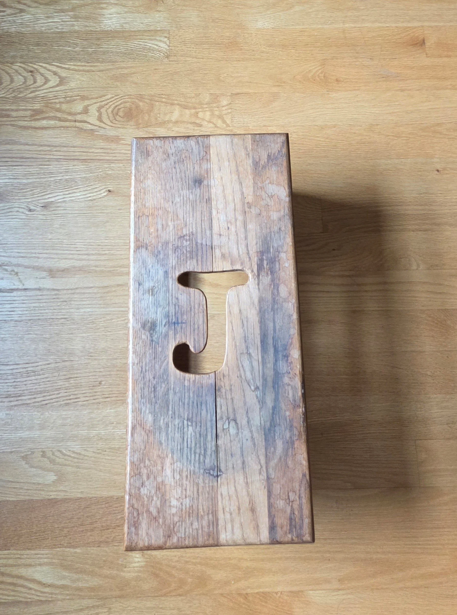 This step stool has Jill's initial which creates an easy-to-use handle. It needs refinishing too!