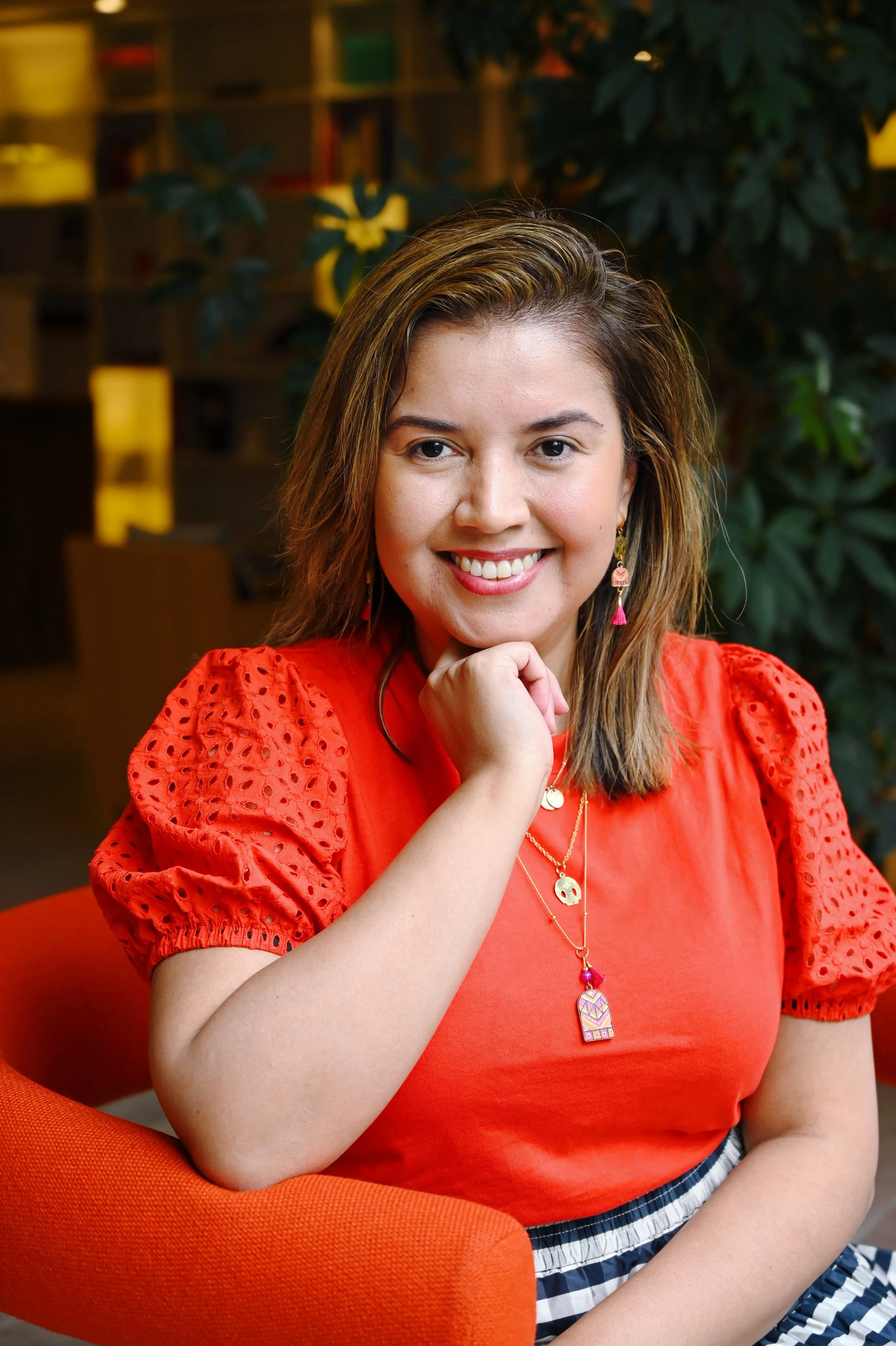 Mariana Peña approved headshot 1 (red top)