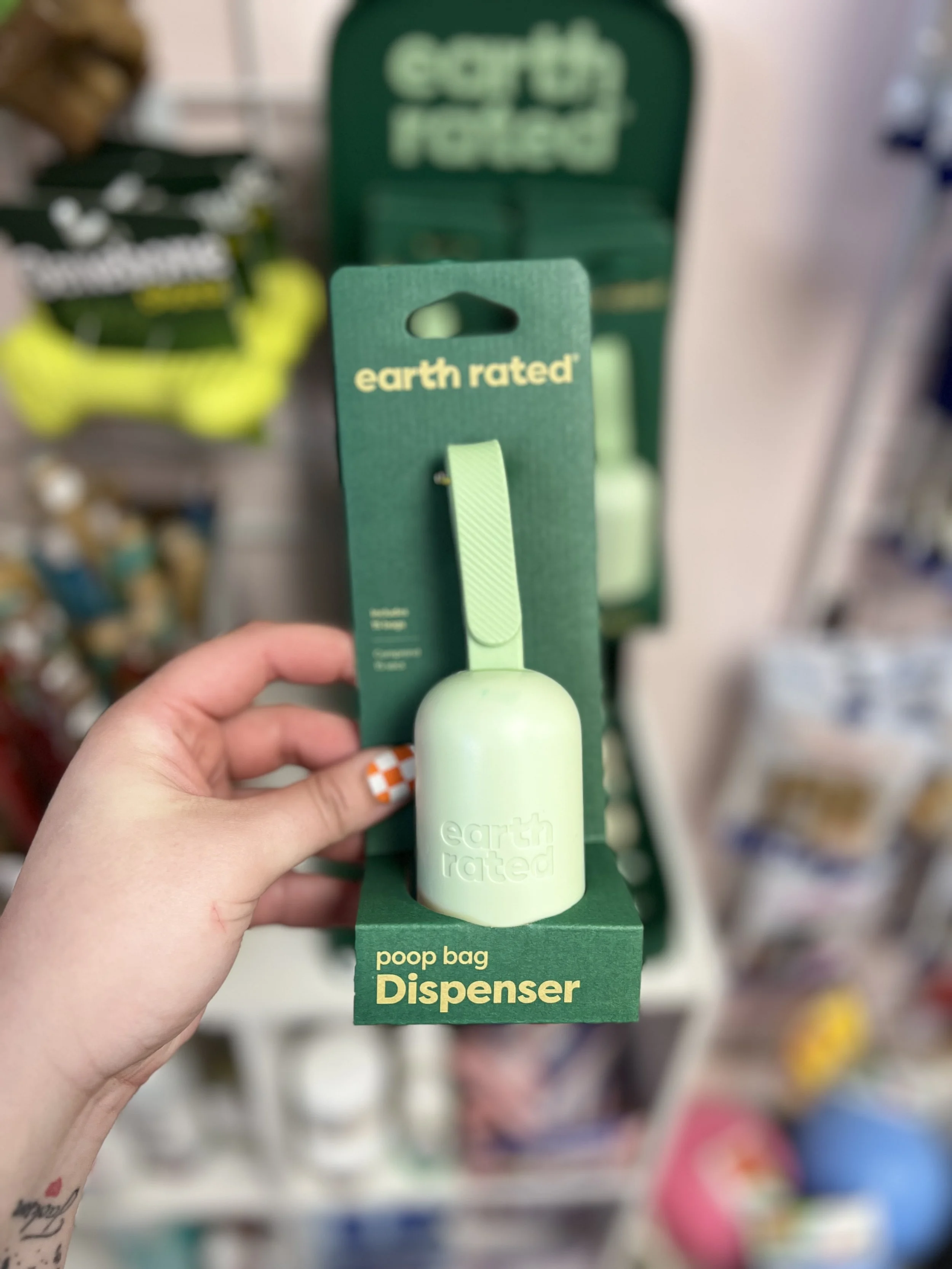 Poop bag dispenser with a 15 bag roll