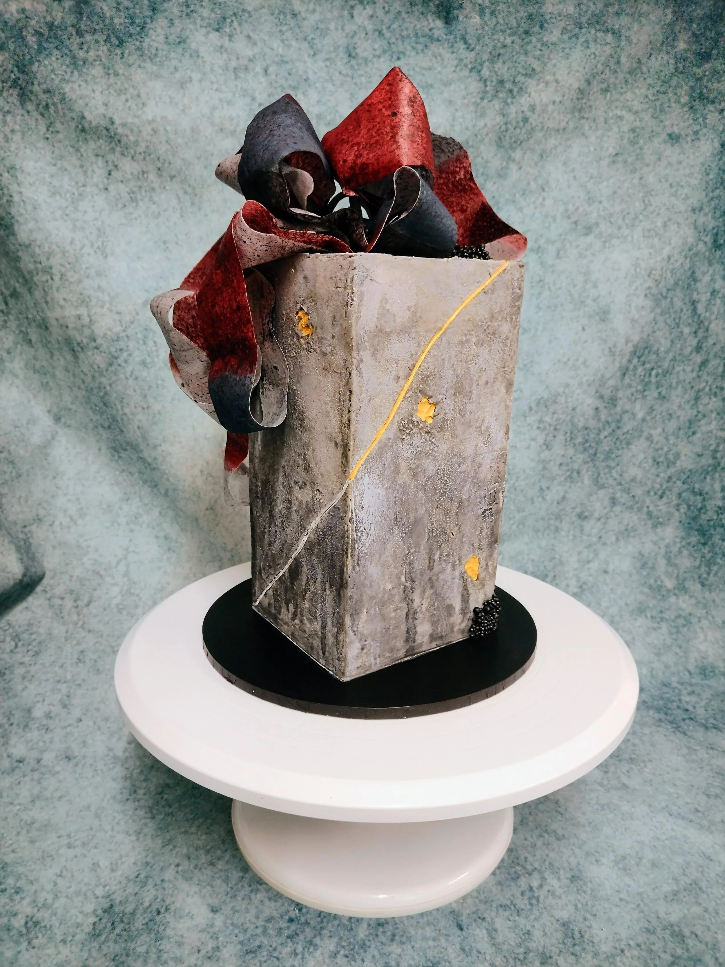 A bespoke birthday cake for a 50th birthday. My client knew exactly what he wanted, and it was enjoyable being set the challenge. I loved making, creating and painting this cake!