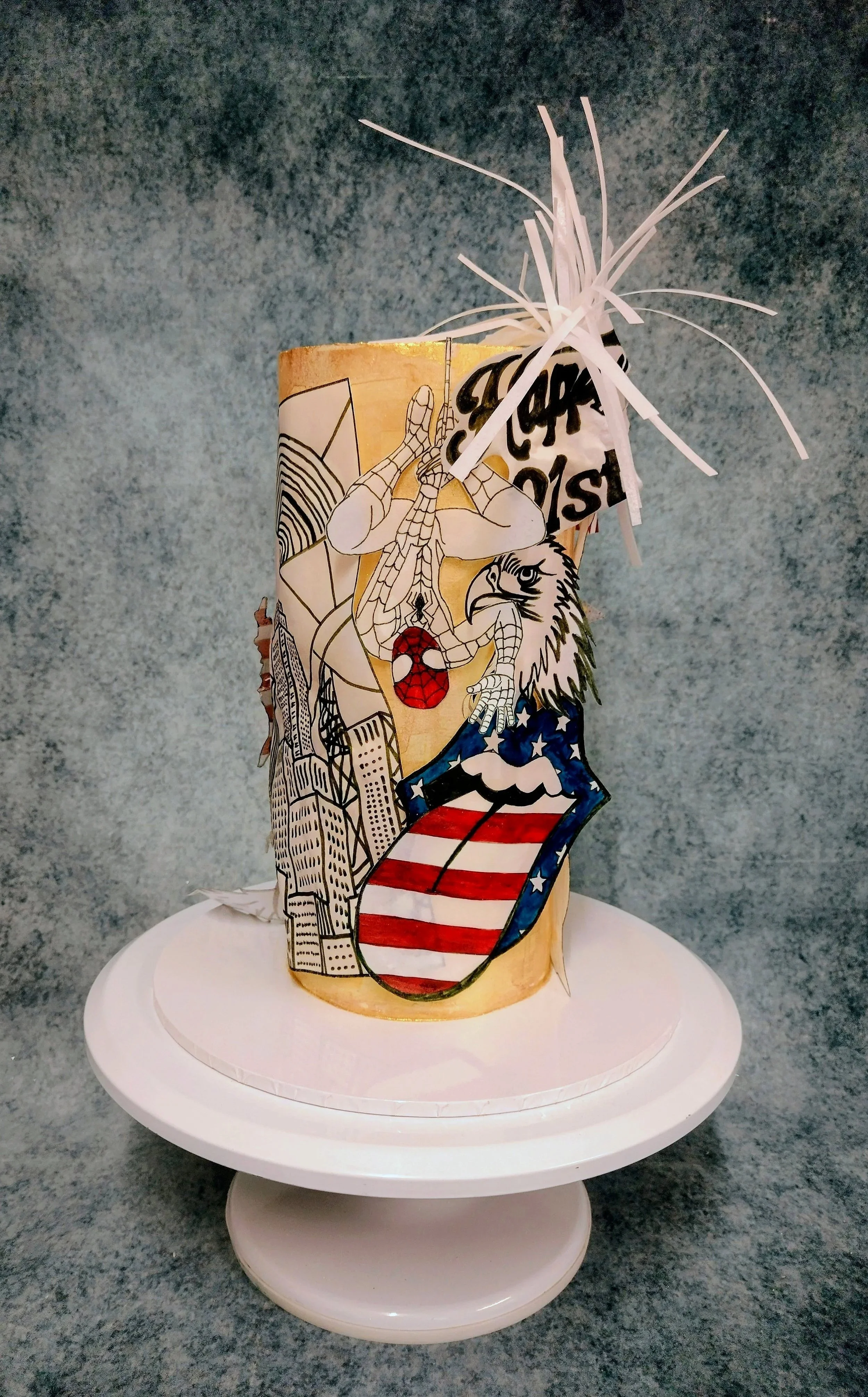P O P - A R T of iconic American landmarks  and logos were hand drawn onto edible wafer paper. Each design being carefully cut before being added as a decorative feature of the cake. 24ca edible gold leaf and gold dust add a visual celebratory impact