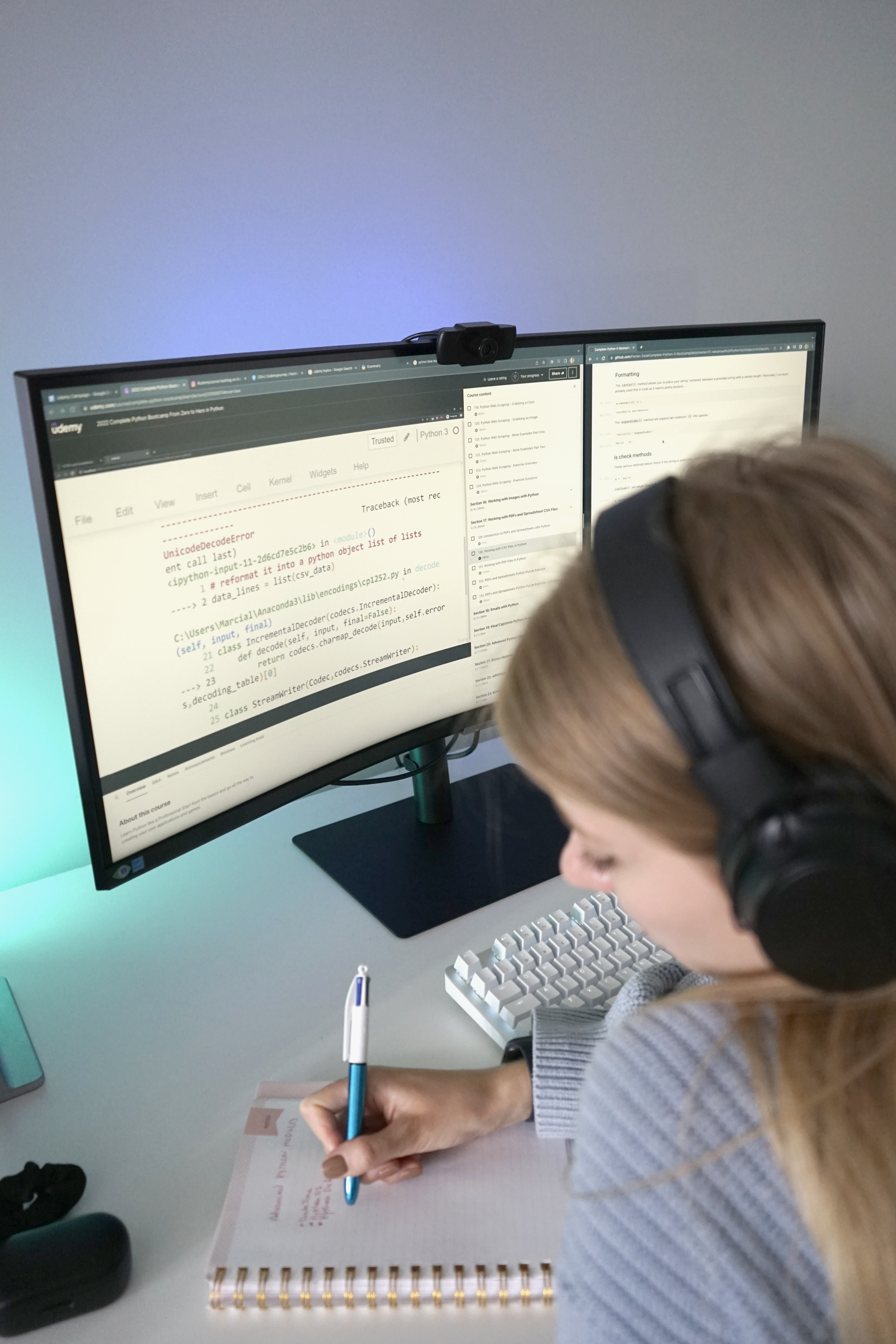 Stacy Tech Influencer promoting Python Bootcamp taking notes