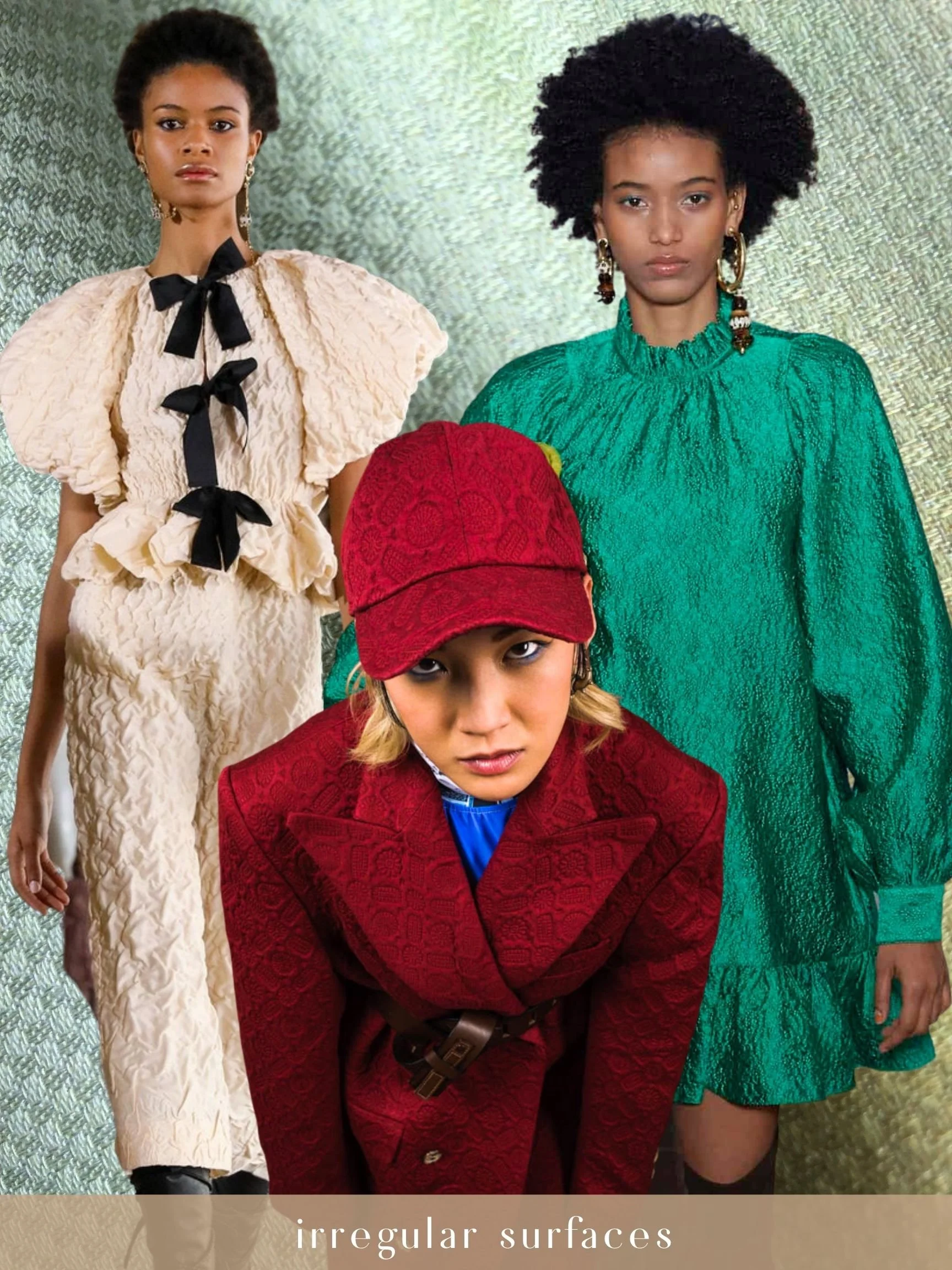 Three women standing against a textured background, all wearing colorful, textured fashion outfits with accessories.