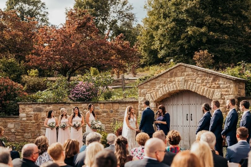 An outdoor wedding ceremony at Pittsburgh Botanical Garden.