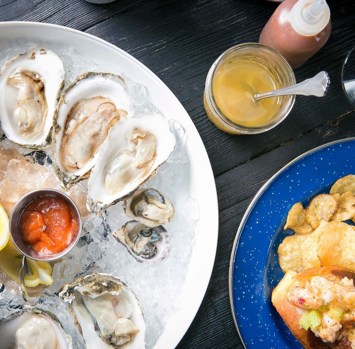 Oysters, a lobster roll, and potato chips from Merchant Oyster Co. in Lawrenceville.