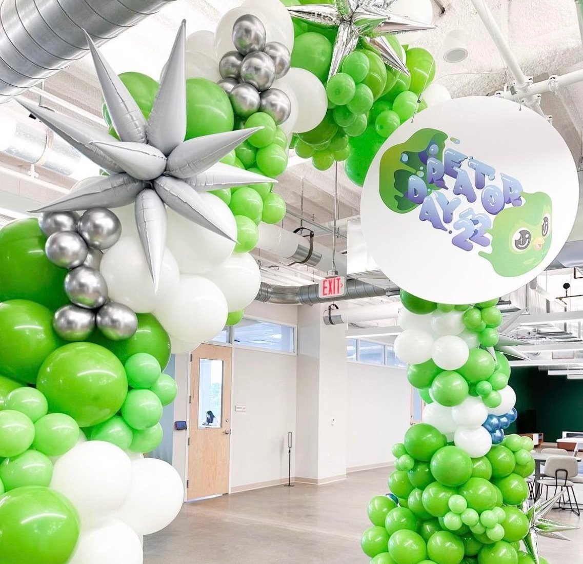 Pittsburgh PA headquarters Duolingo balloon arch social media content creator day balloon garland in green silver and white
