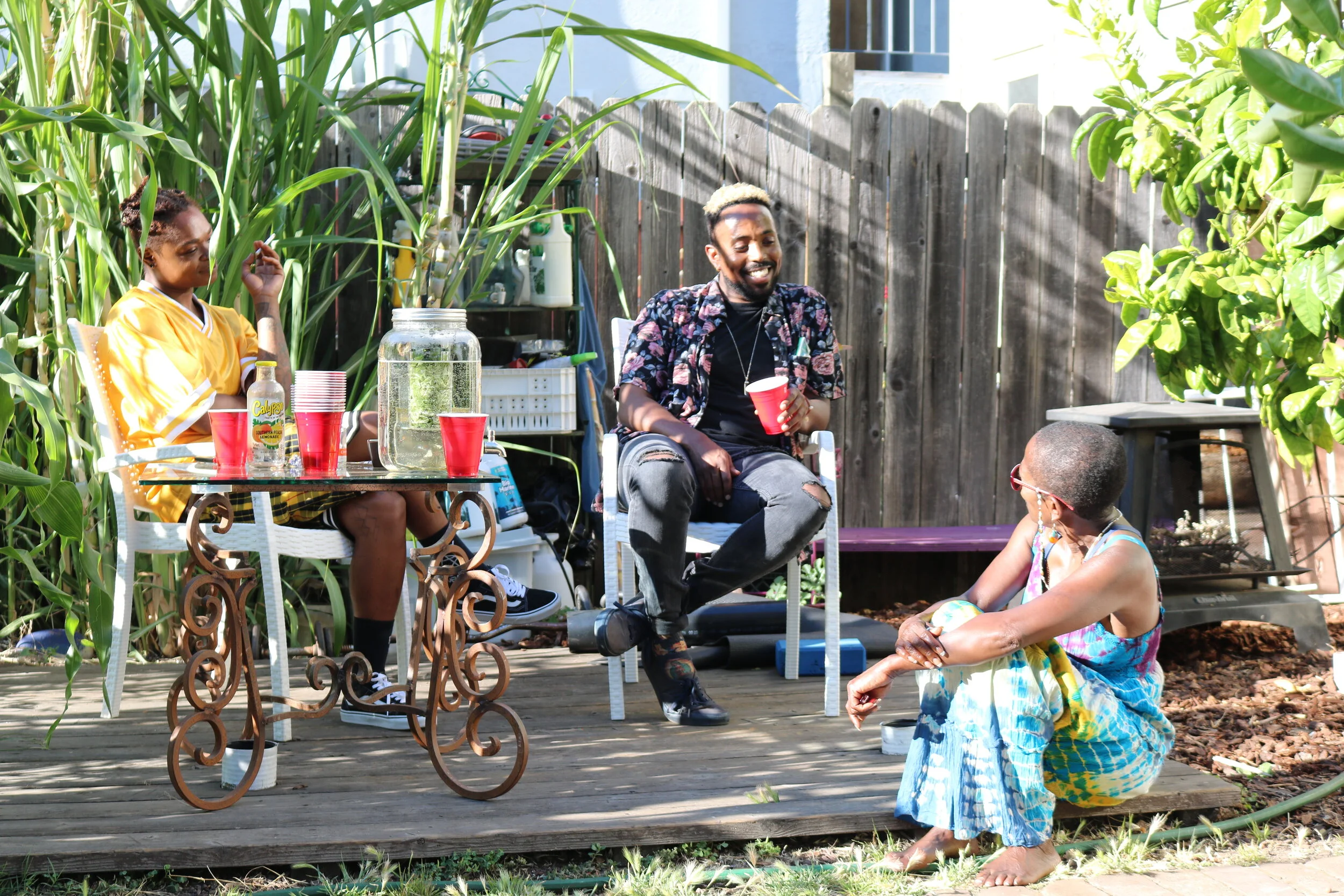 Black guest enjoying the backyard at B-Love's Guesthouse