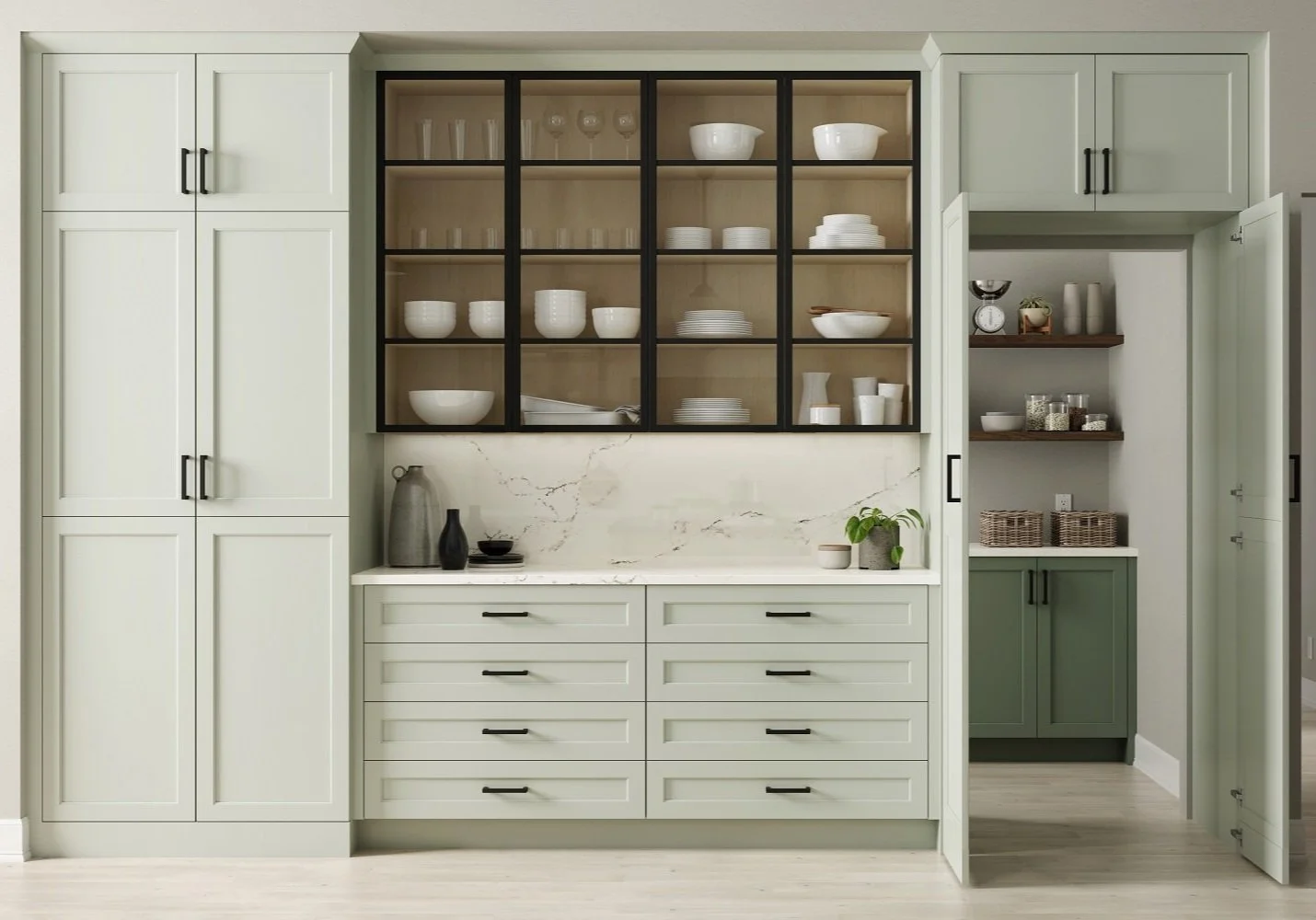 Kitchen with pale green cabinetry, glass-fronted upper shelves with dishes, and a marble backsplash, featuring decorative vases and a potted plant.