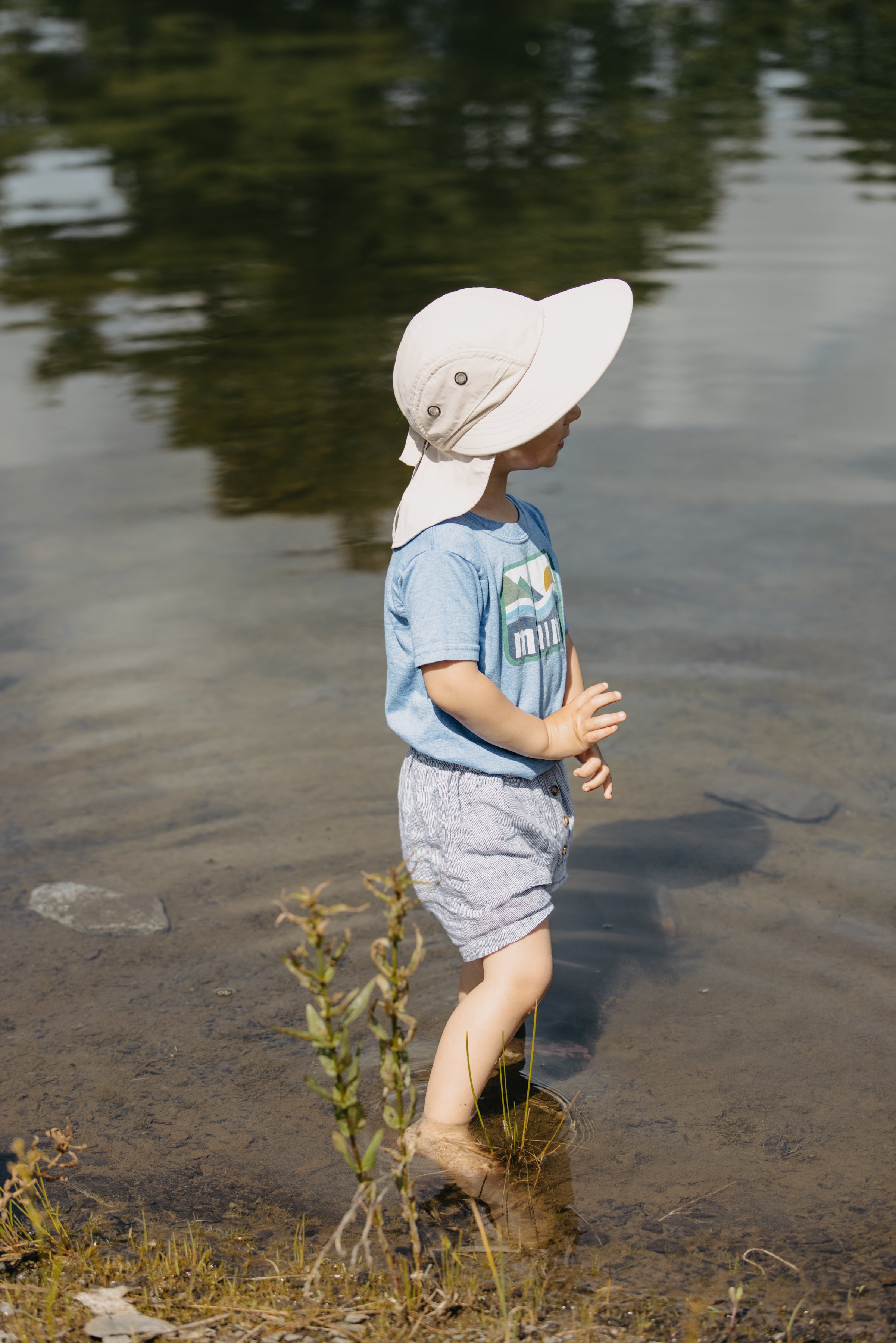 Child standing in shallow water