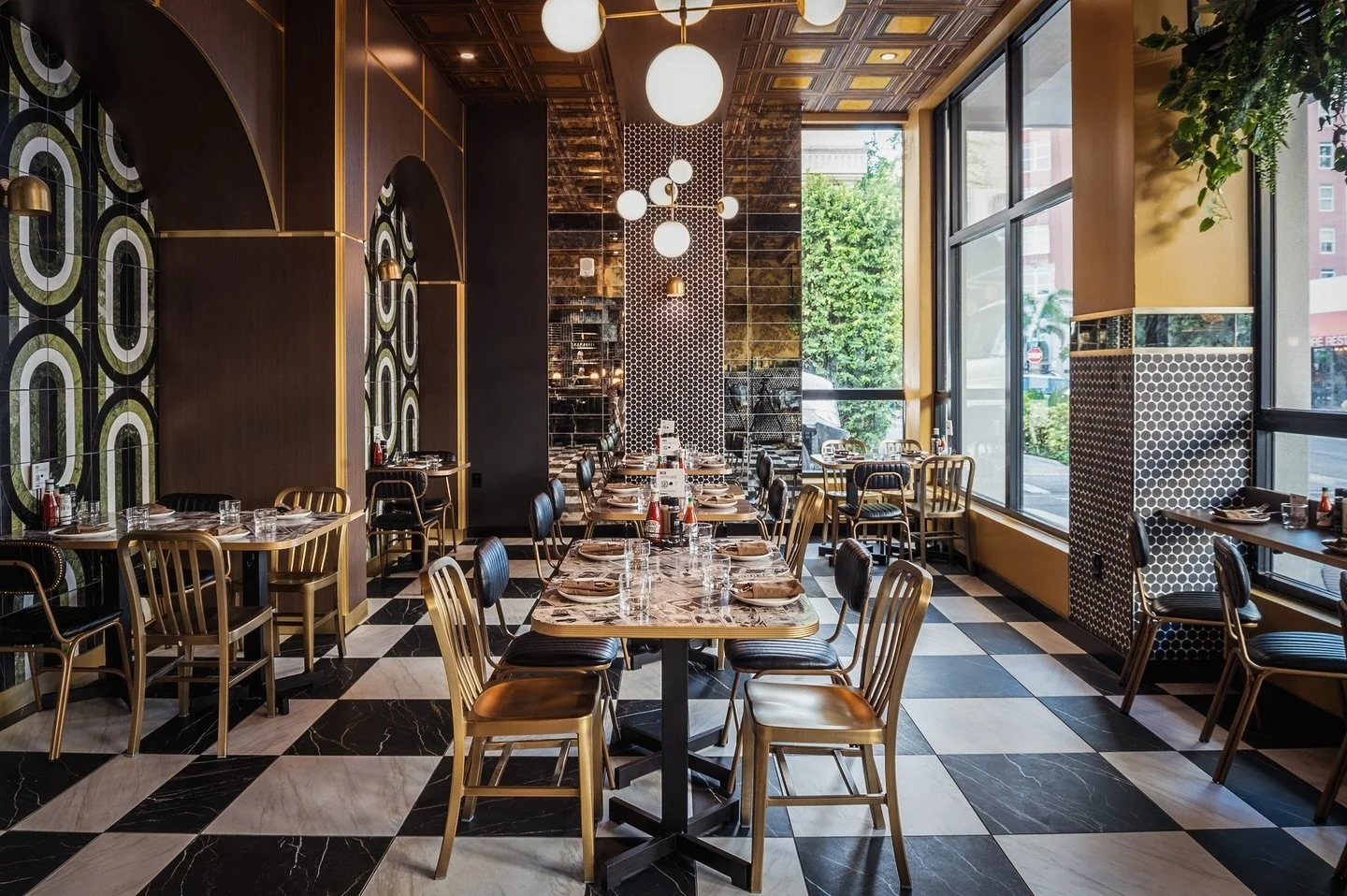 Vintage | MOD | Glamour - This photo certainly captures the essence of those three words! Our inspiration for the deli was based off of the 1930&rsquo;s-1960&rsquo;s merging our favorite looks from each time period. We love the vintage brass metals, 