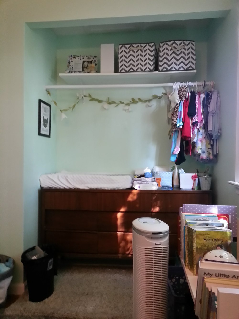 Her open closet features a dresser made by my grandfather