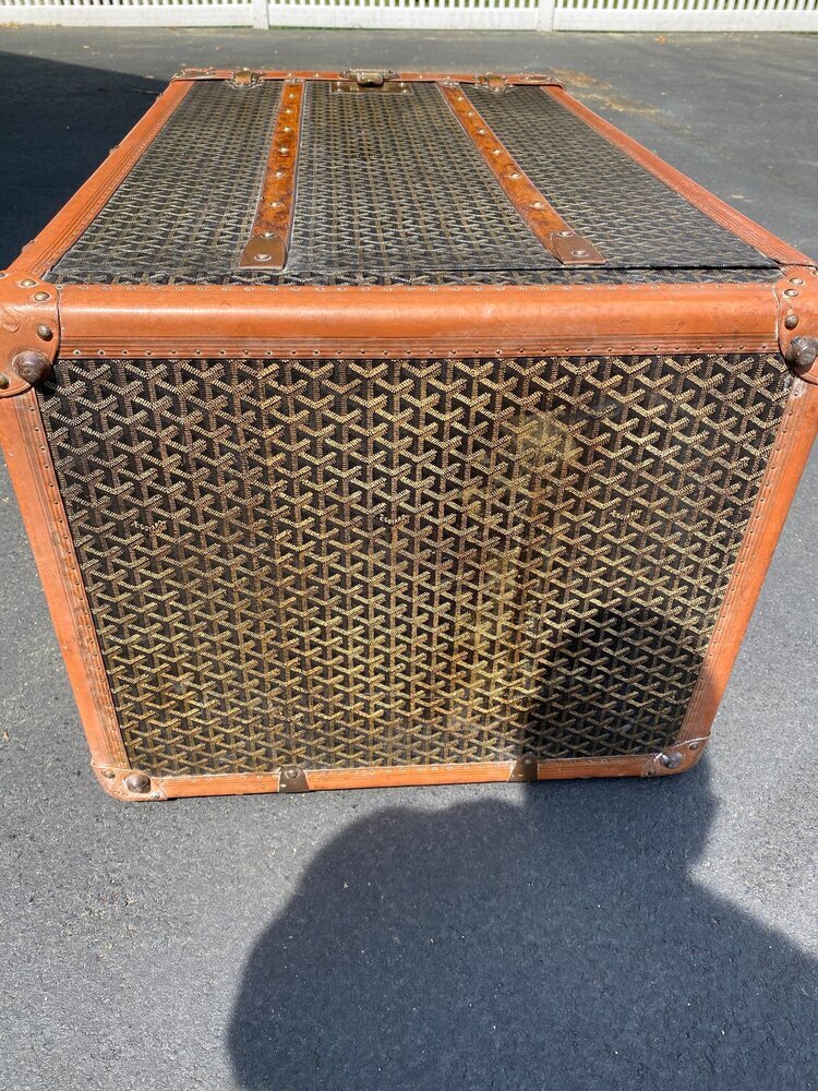 Goyard trunk for sale laying on the side.jpeg