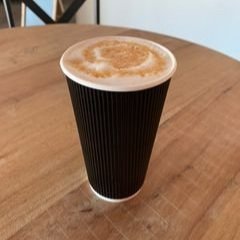 purrology cat cafe picture of a latte