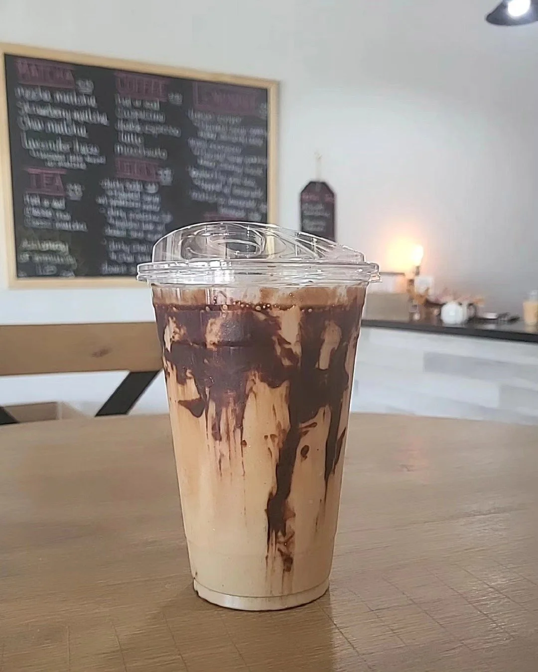 purrology cat cafe picture of a drink with chocolate sauce