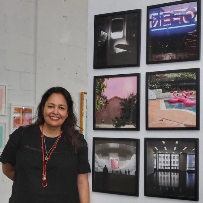 The Artist and some of her photography at the JCAST HQ show 2019.
