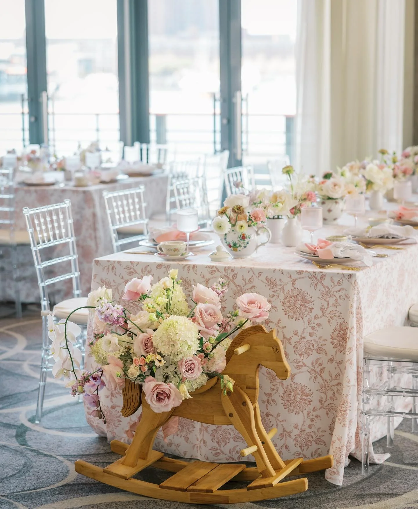 Tea time, but make it dreamy ✨🫖

From floral-draped rocking horse end caps to custom letterpress menus, every detail was curated to the girly, bow-loving style of these sweet mama-to-bes, two sister-in-laws both expecting baby girls this winter. A d