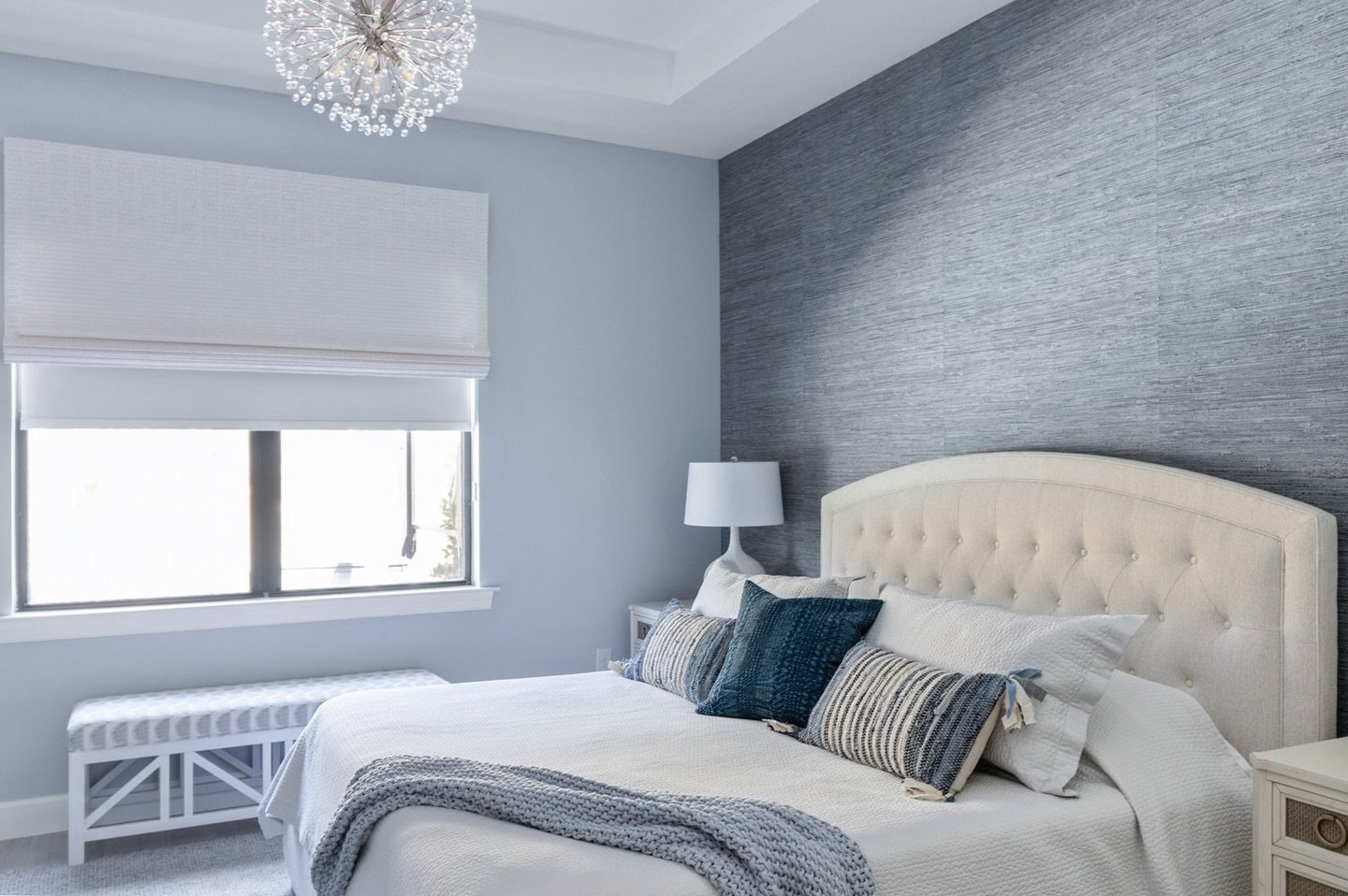 Designing a bedroom involves many selections to create a pleasing design. The layering of wallpaper, wall color, rugs, bedding, window treatments, lighting, accessories, and furniture must blend well for a compelling and inviting space. Follow along 