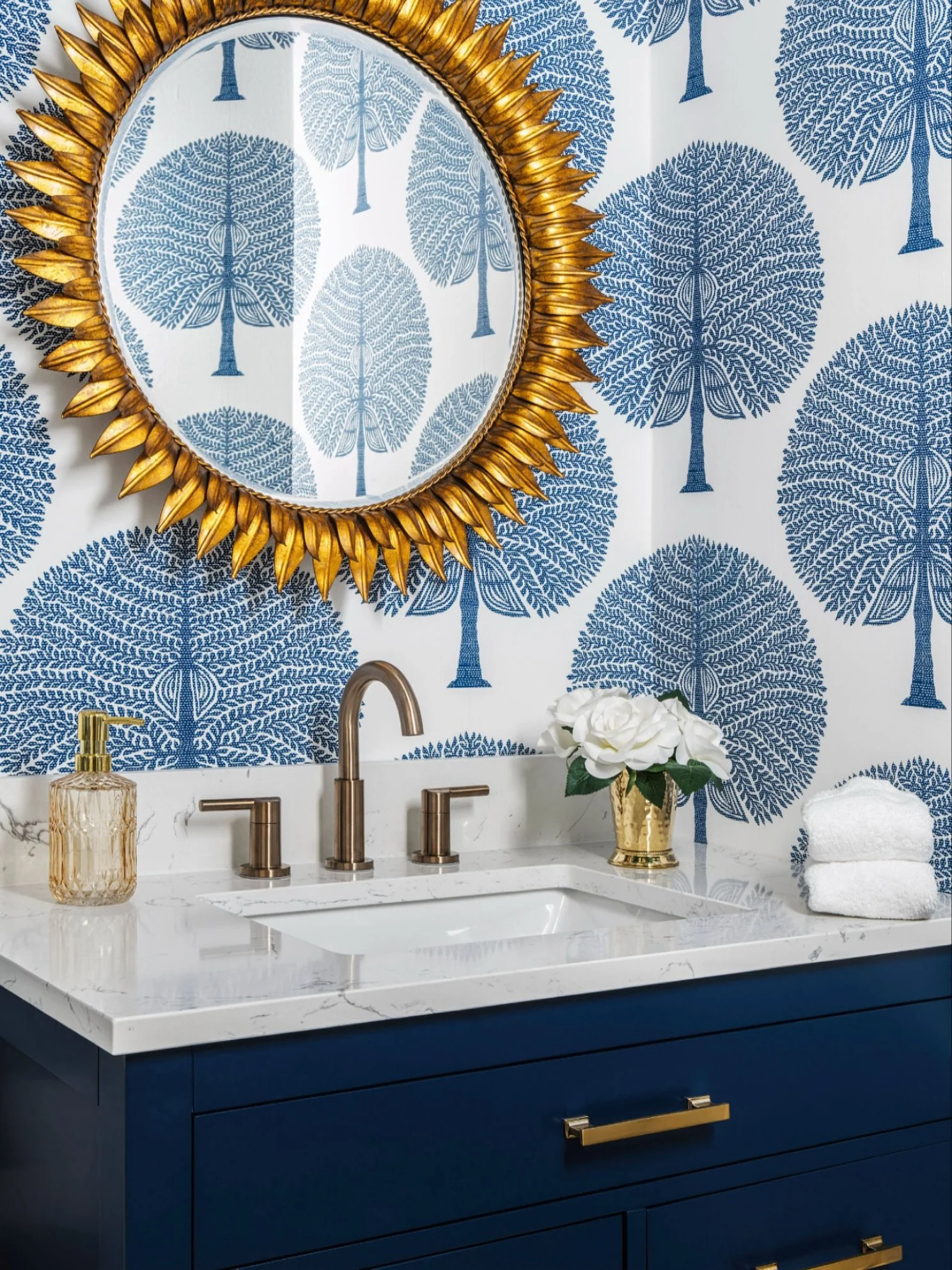 We loved creating a jewel box feeling in this powder room design. It's the perfect place to add wallpaper, too! Get inspired @sandraasdourianinteriors photography  @tristanheeb #powderroomdesign #naplescontemporarycoastalinteriors #naplescontemporary