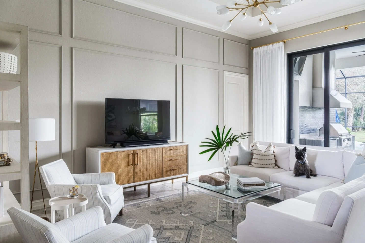 When designing this living room, I focused on adding architectural elements that truly create a personal and inviting space for my clients. Interior design is going through an exciting time, as people are reimagining their homes. It’s not just