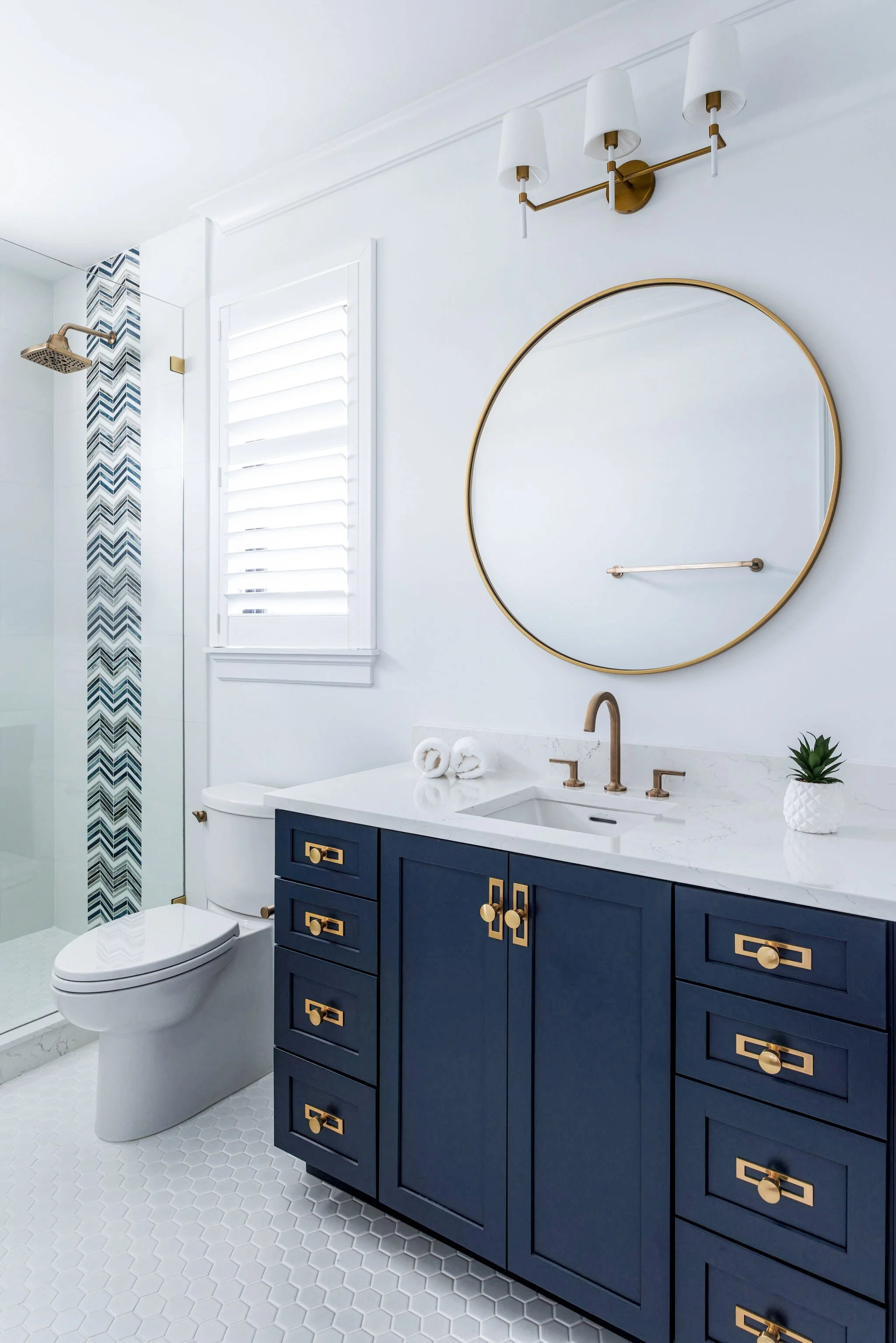 Sandra Asdourian Interiors Navy Bathroom Marco Island FL.jpg