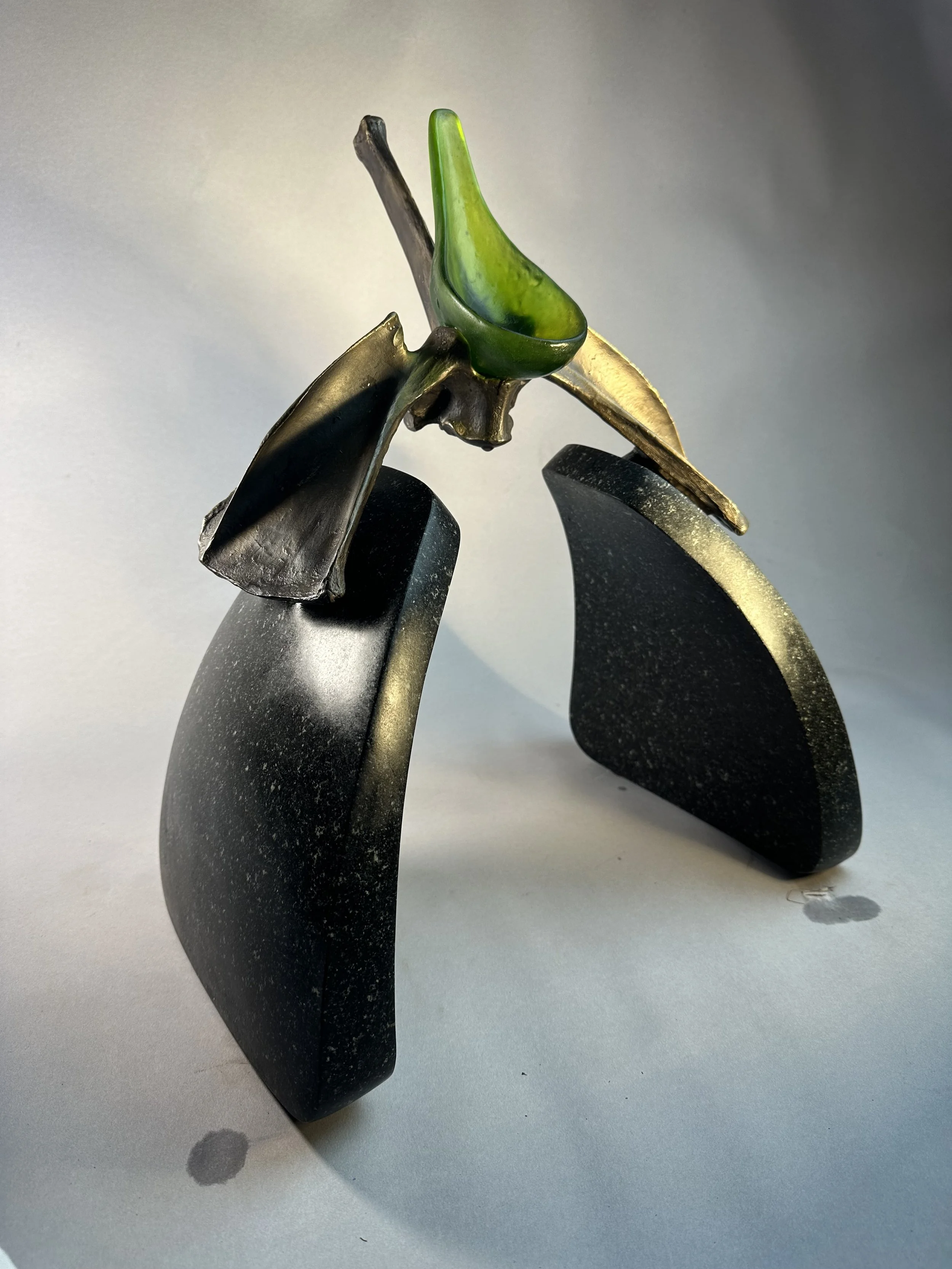 Green Journey. granite, glass, bronze. 2023. 10"x8"x16"
