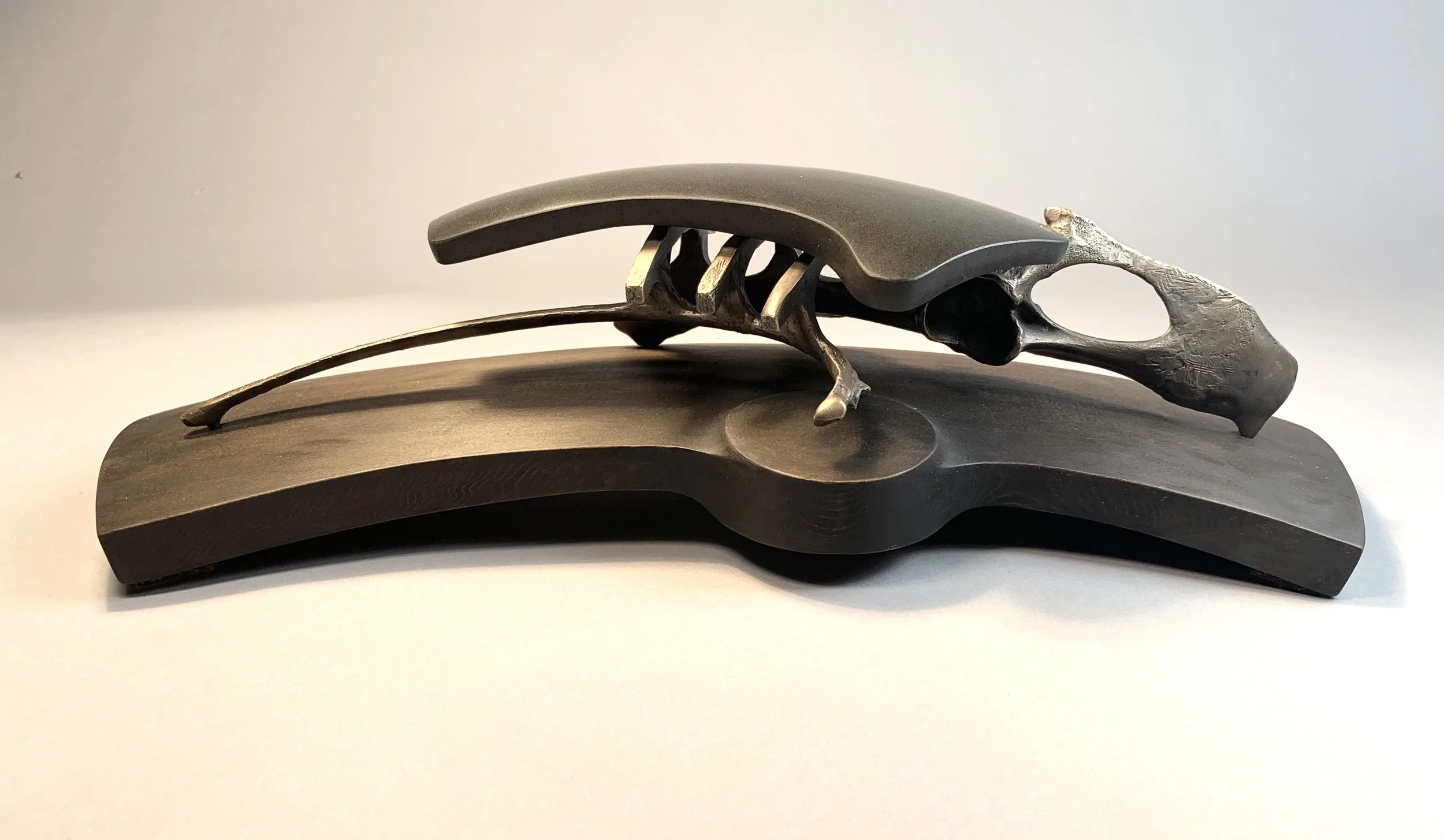 Shelter Series #4. basalt, bronze, cedar. 2022. 14"x5"x5"