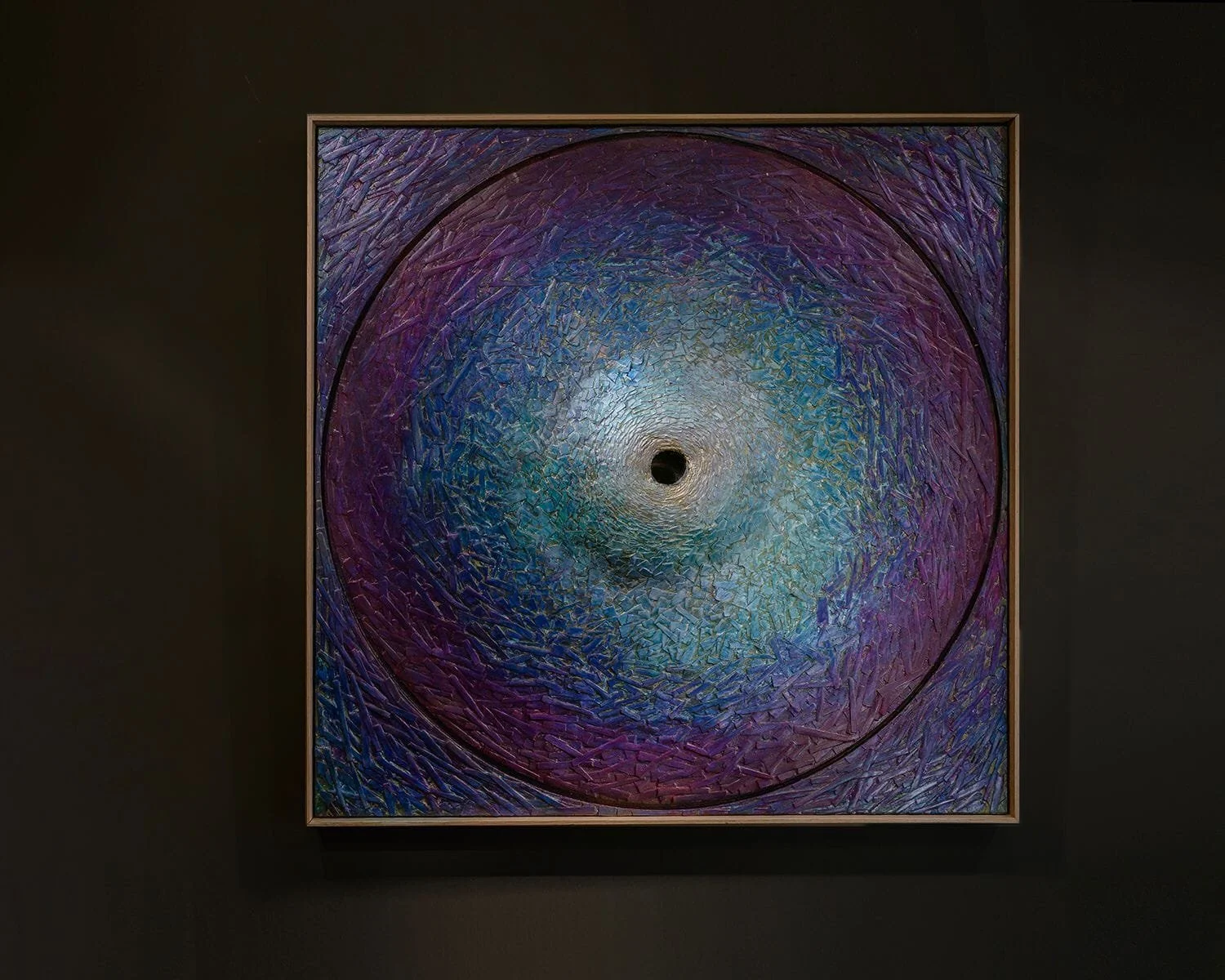 Purple, blue and turquoise vortex relief with a dark centre, by Michel Mullèr