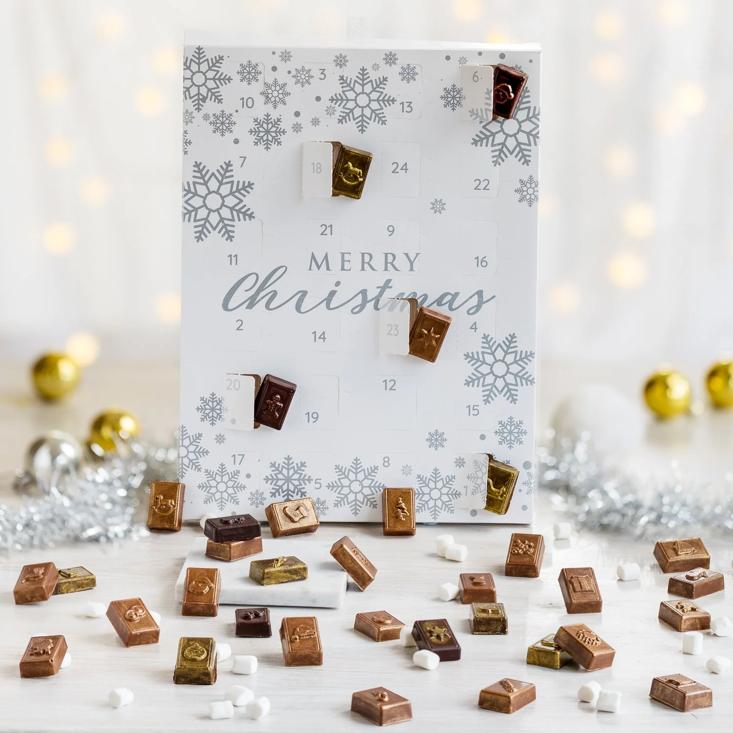 Make your own advent calendar at a fun Christmas Chocolate workshop with chocolate by Miss Witt .  A Delicious festive activity adults in the new forest at careys manor hotel